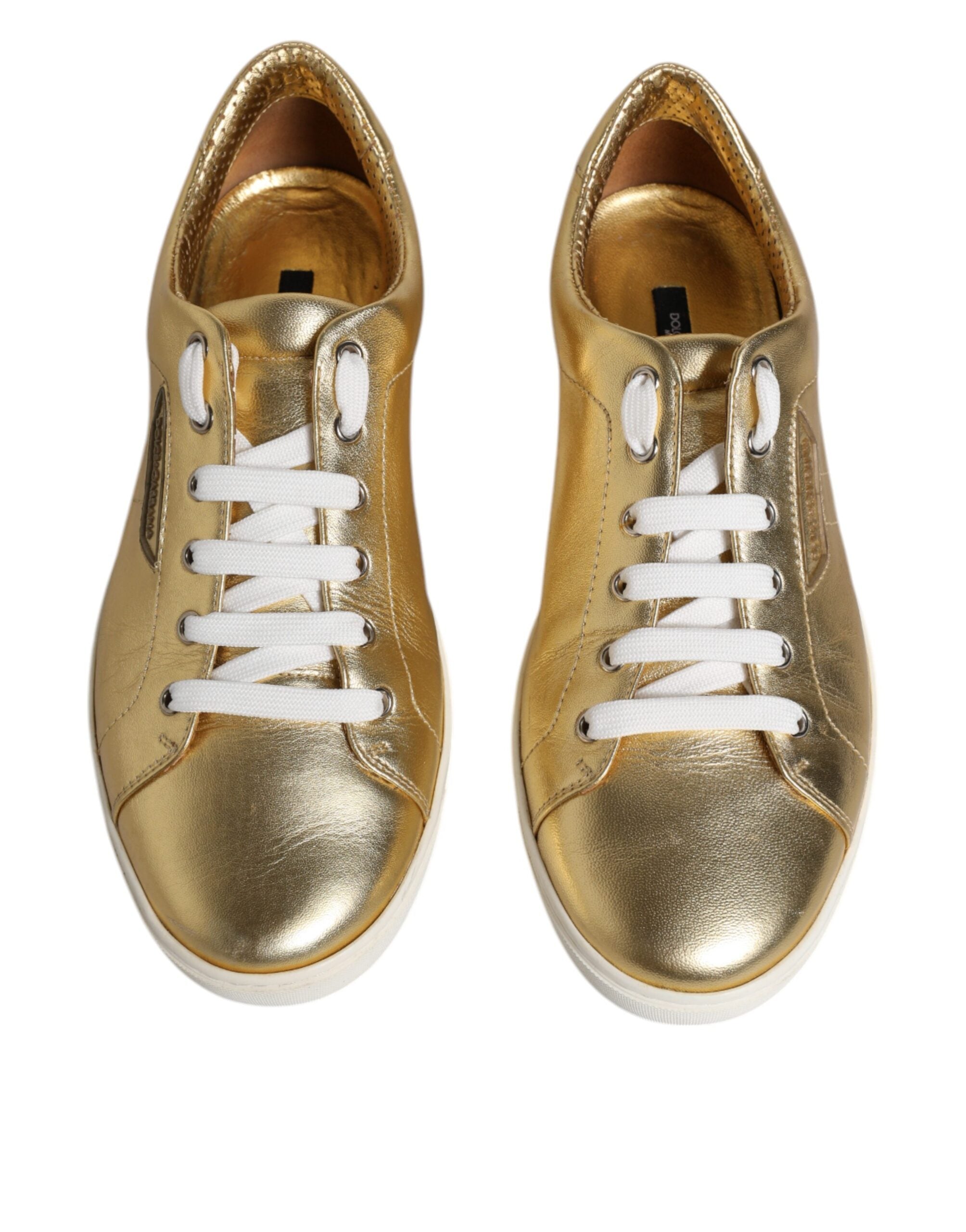 Chaussures sneakers pour hommes Dolce & Gabbana en cuir doré avec logo London, visibles sur l'image.