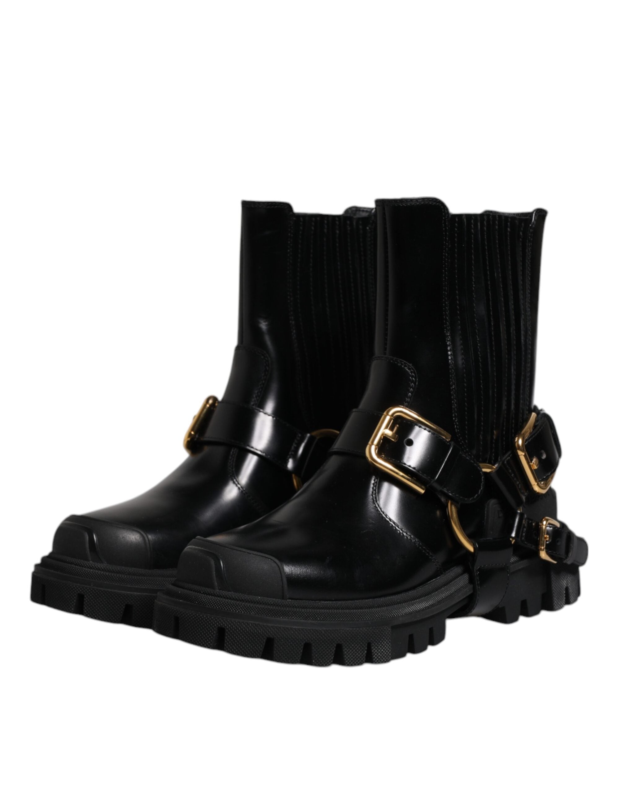 Chaussures Dolce & Gabbana en cuir noir, bottines slip-on stretch pour trekking, style élégant et confortable.
