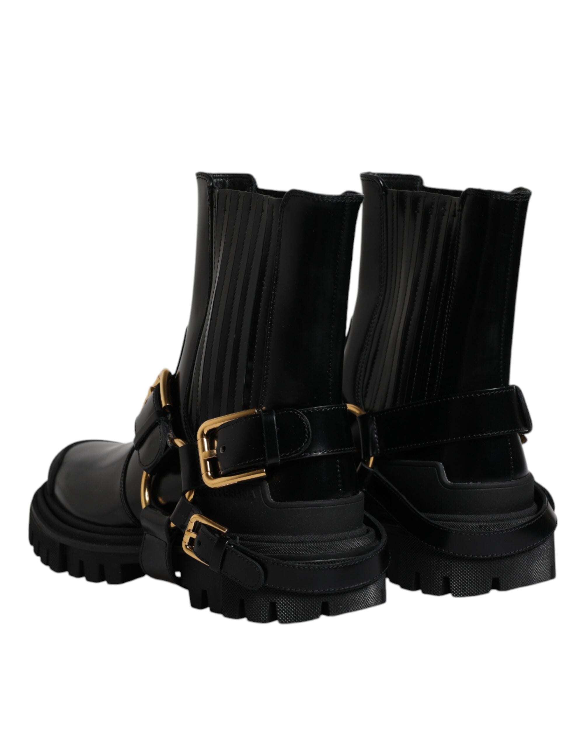 Chaussures de trekking en cuir noir Dolce & Gabbana, bottines slip-on avec stretch, style robuste et élégant.