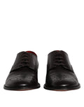 Chaussures derby pour homme en cuir de veau noir de Dolce & Gabbana, élégantes et sophistiquées.