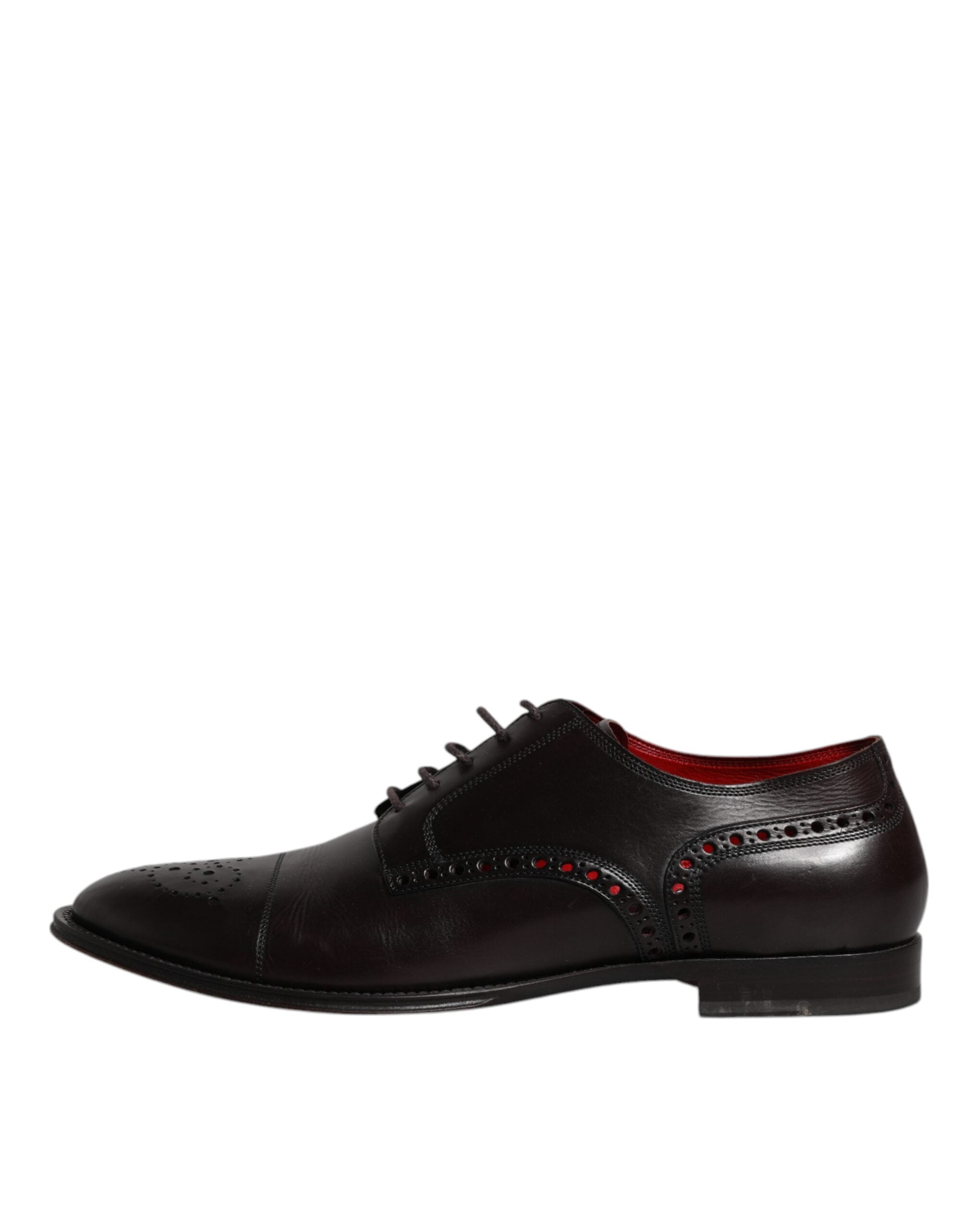 Chaussures Derby en cuir de veau noir de Dolce & Gabbana pour homme, élégantes et sophistiquées, visibles en gros plan.