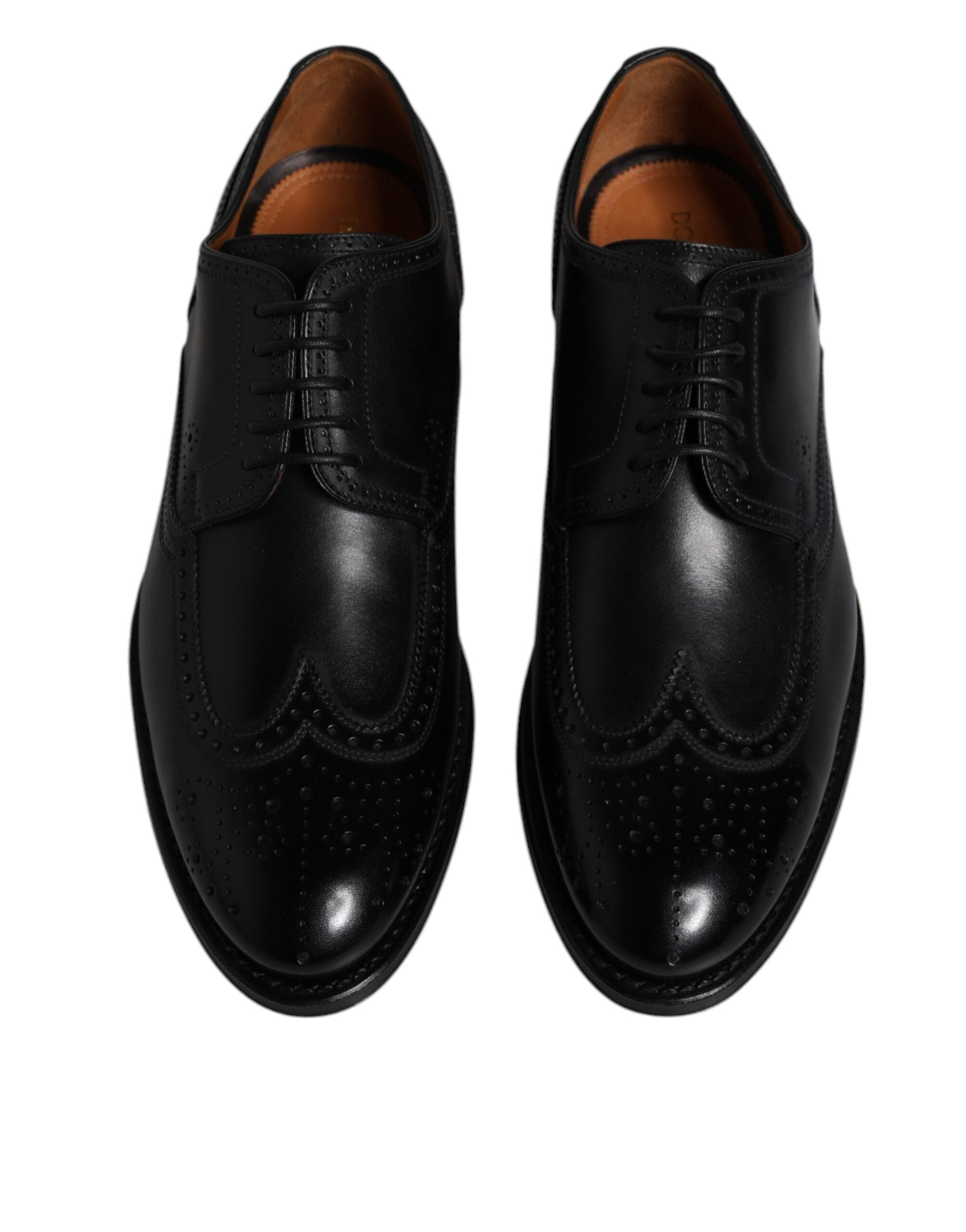 Chaussures derby noires en cuir Dolce & Gabbana avec détails wingtip formels et élégants.