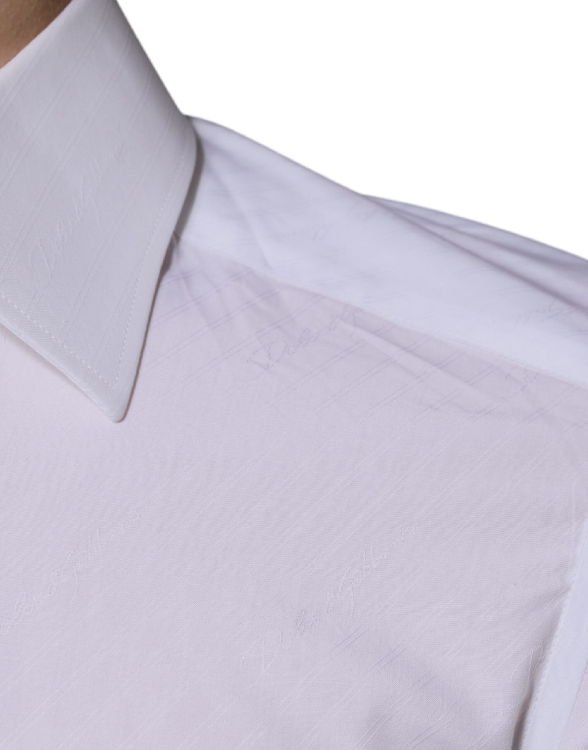 Chemise blanche en coton à manches longues Dolce & Gabbana, costume élégant avec boutons dorés et col classique.