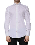 Chemise formelle en coton blanc Dolce & Gabbana à manches longues, élégante et sophistiquée, visible sur l'image.