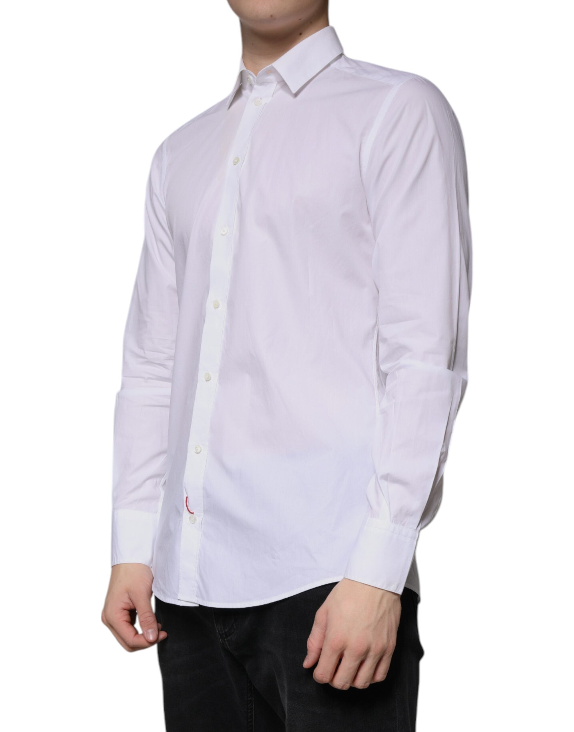 Chemise formelle blanche en coton Dolce & Gabbana à manches longues, élégante et classique, vue de face.