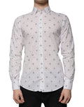Chemise homme Dolce & Gabbana blanche en coton à imprimé, coupe slim fit, élégante et moderne, visible sur l'image.