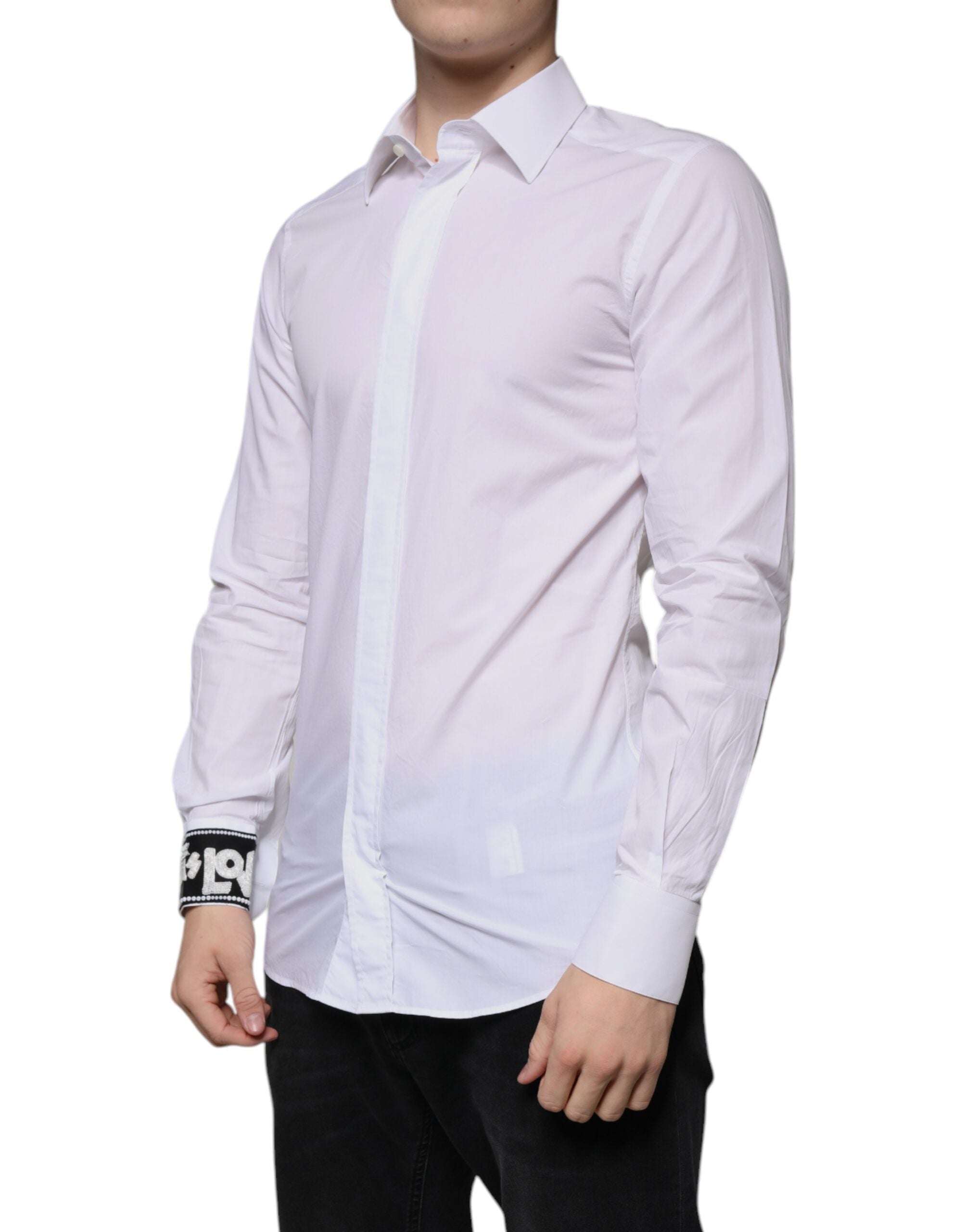Chemise blanche en coton Dolce & Gabbana pour homme, coupe slim fit avec détails dorés élégants.