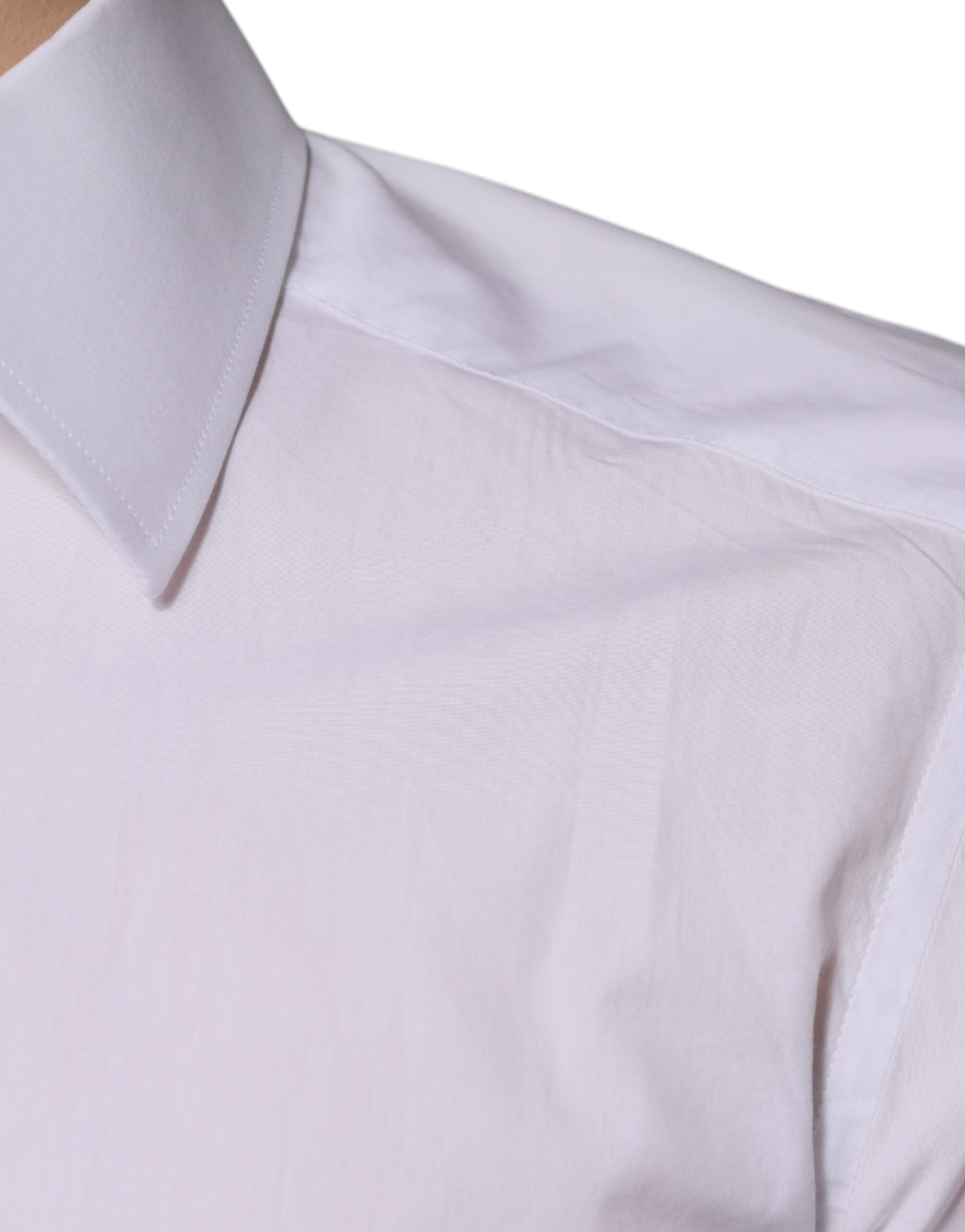Chemise blanche en coton Dolce & Gabbana pour homme, coupe slim fit, avec boutons dorés et design élégant.