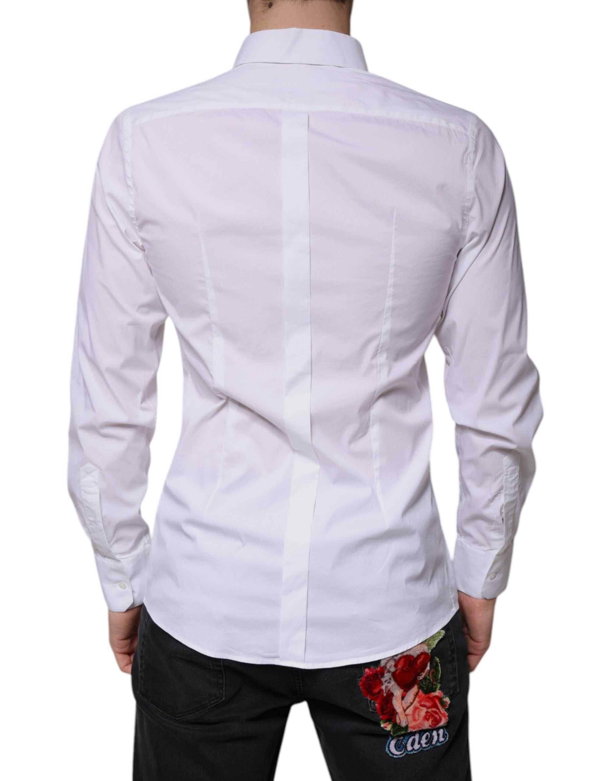 Chemise blanche en coton à manches longues de Dolce & Gabbana avec détails en or, élégant vêtement pour homme.