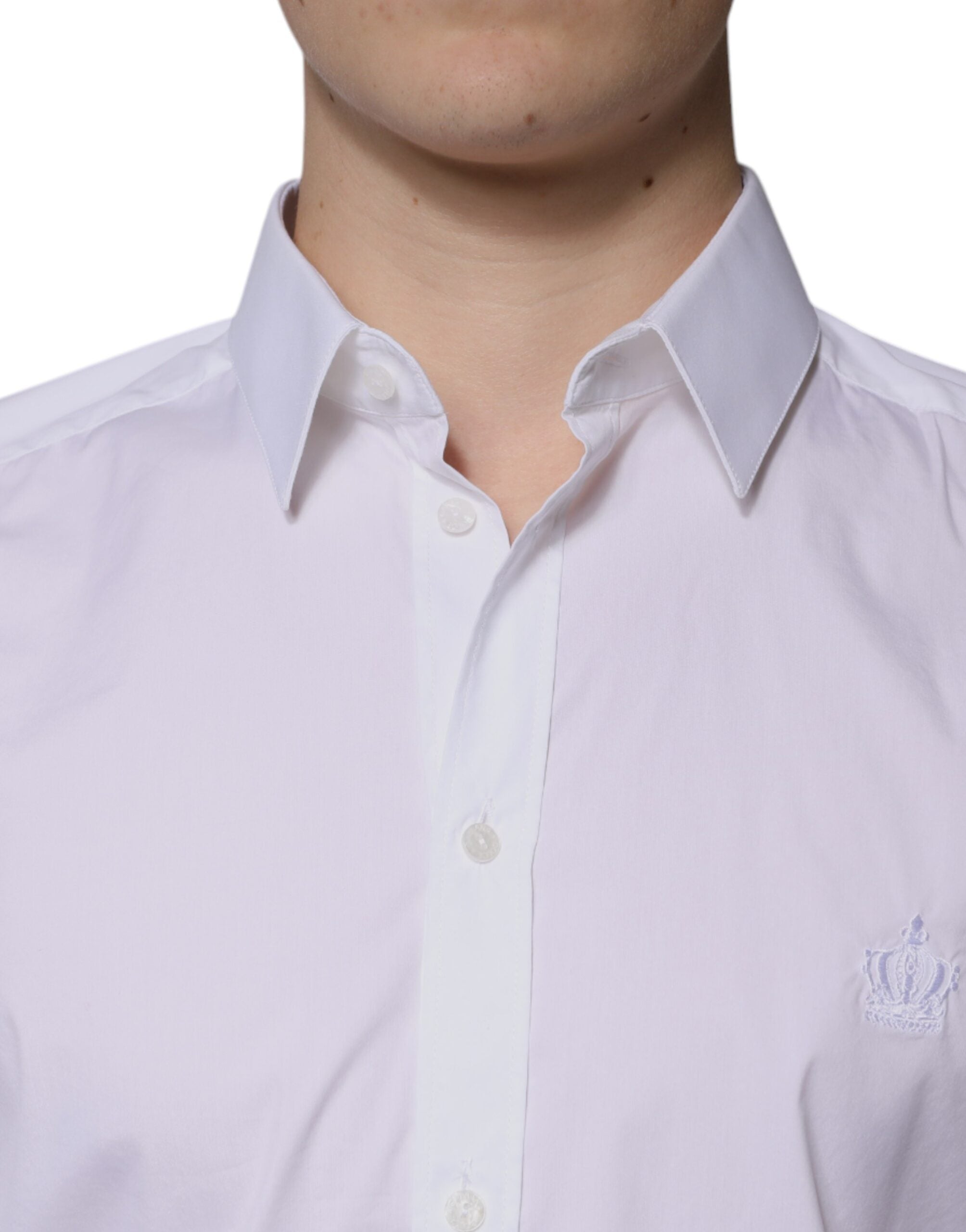 Chemise blanche en coton à manches longues Dolce & Gabbana avec détails dorés, élégante et sophistiquée pour homme.