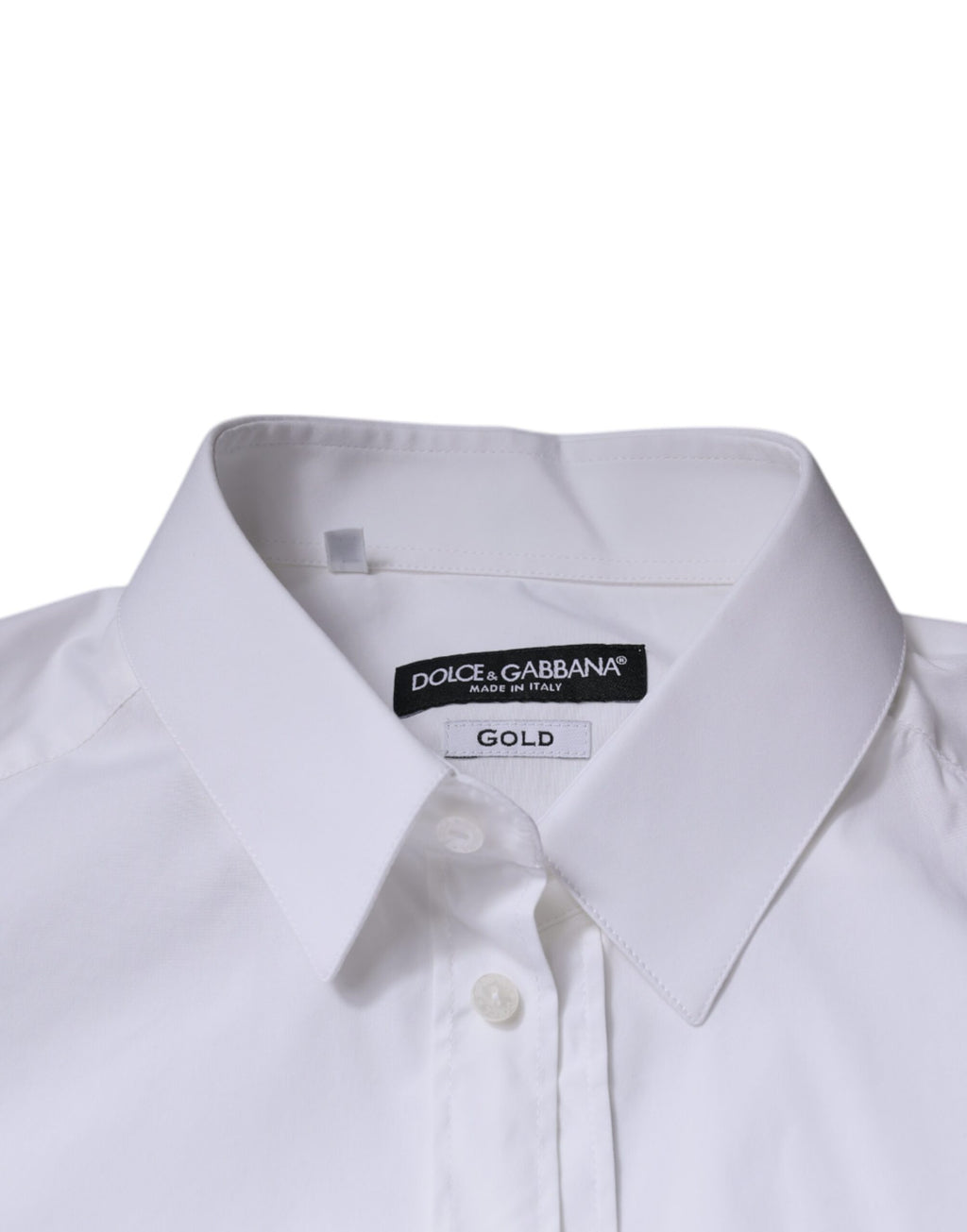 Chemise blanche en coton à manches longues Dolce & Gabbana, élégante et raffinée, avec détails dorés visibles sur la photo.