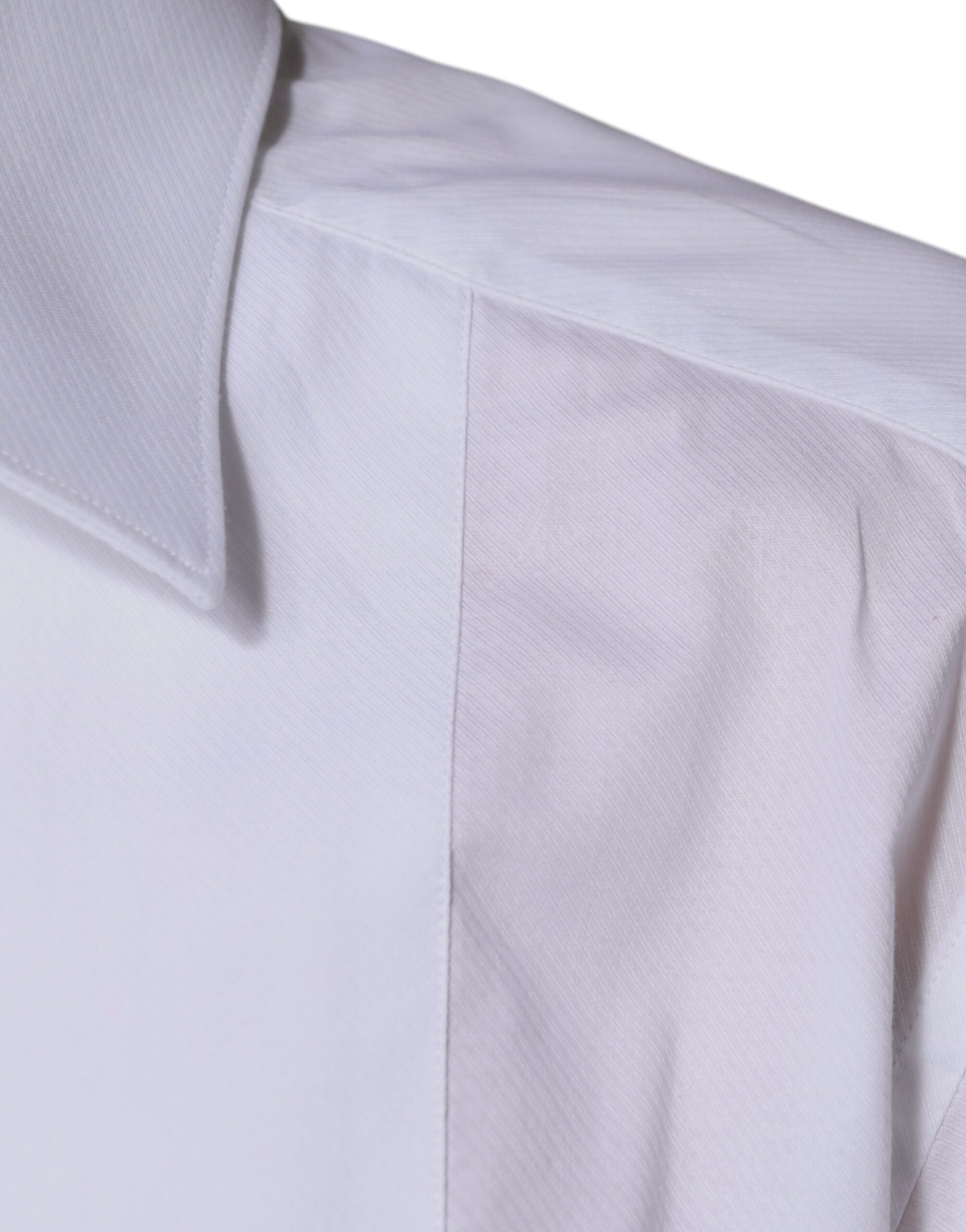 Chemise blanche en coton popeline Dolce & Gabbana avec un plastron or, style formel élégant et sophistiqué.