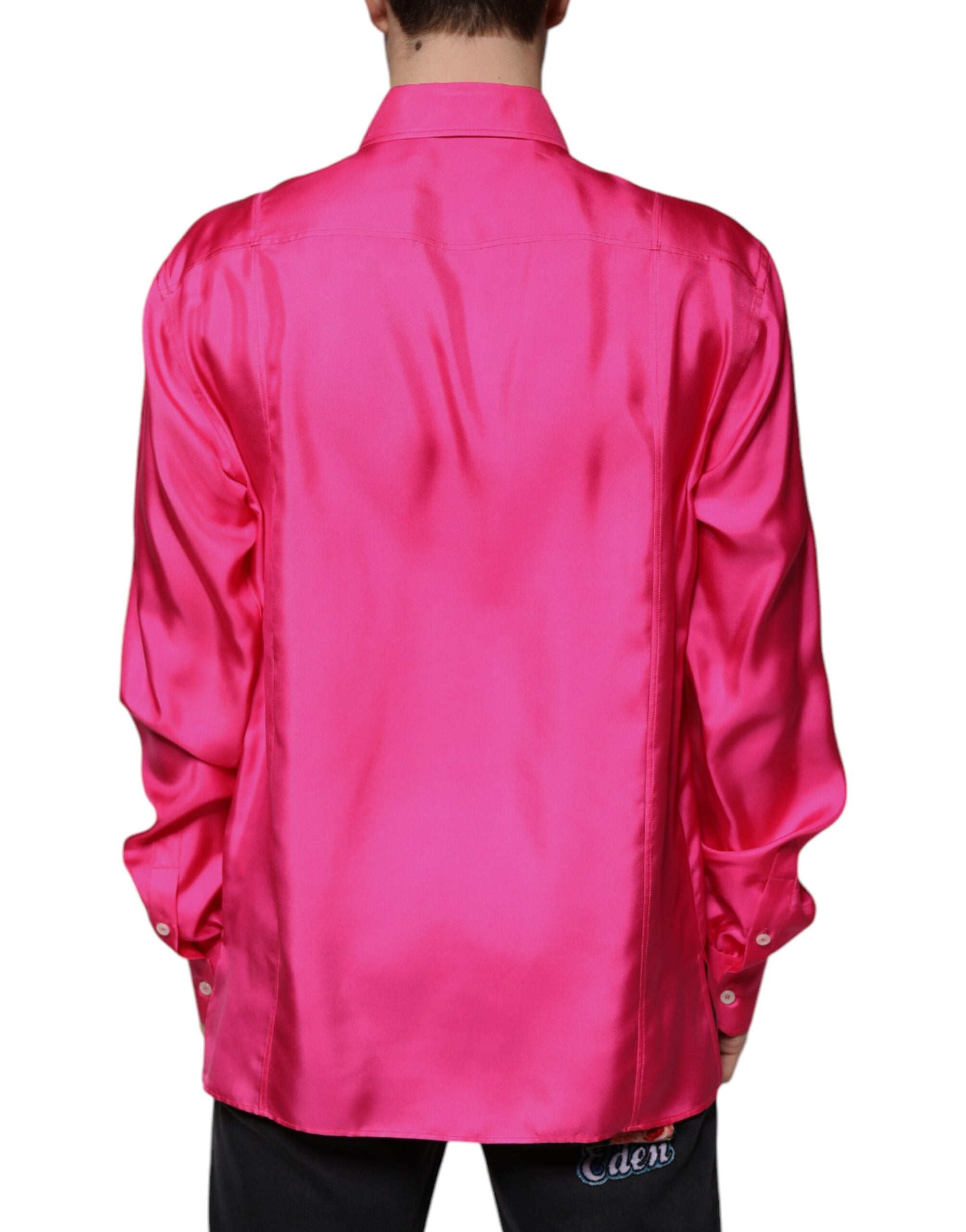 Chemise homme en soie rose Dolce & Gabbana avec col et boutons, élégance sophistiquée et détails raffinés.