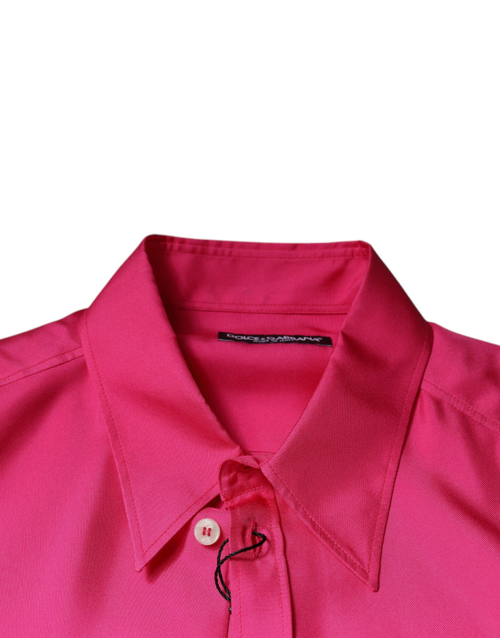 Chemise homme en soie rose Dolce & Gabbana avec col et boutons, élégante et sophistiquée.
