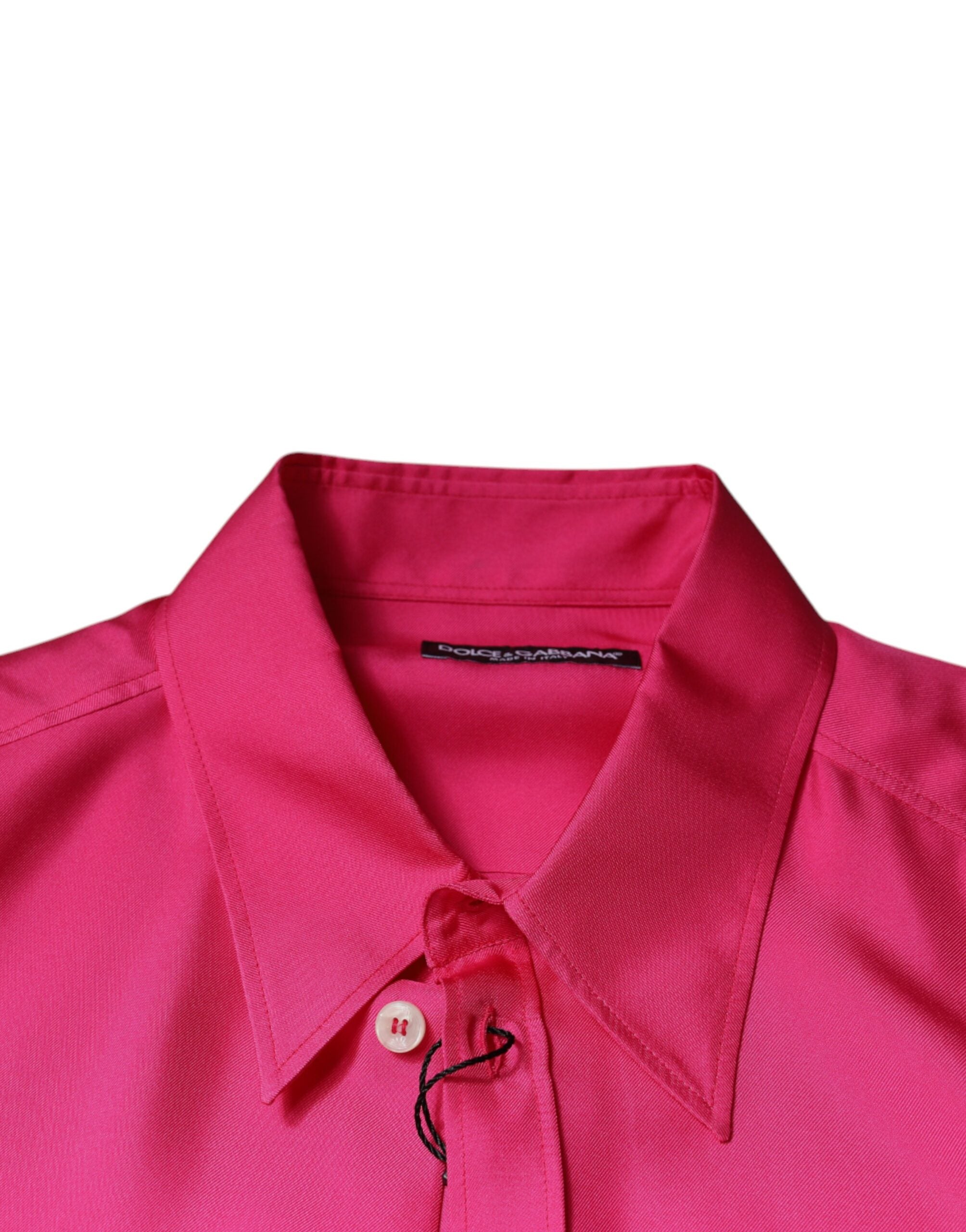 Chemise homme en soie rose Dolce & Gabbana avec col et boutons, élégante et sophistiquée.