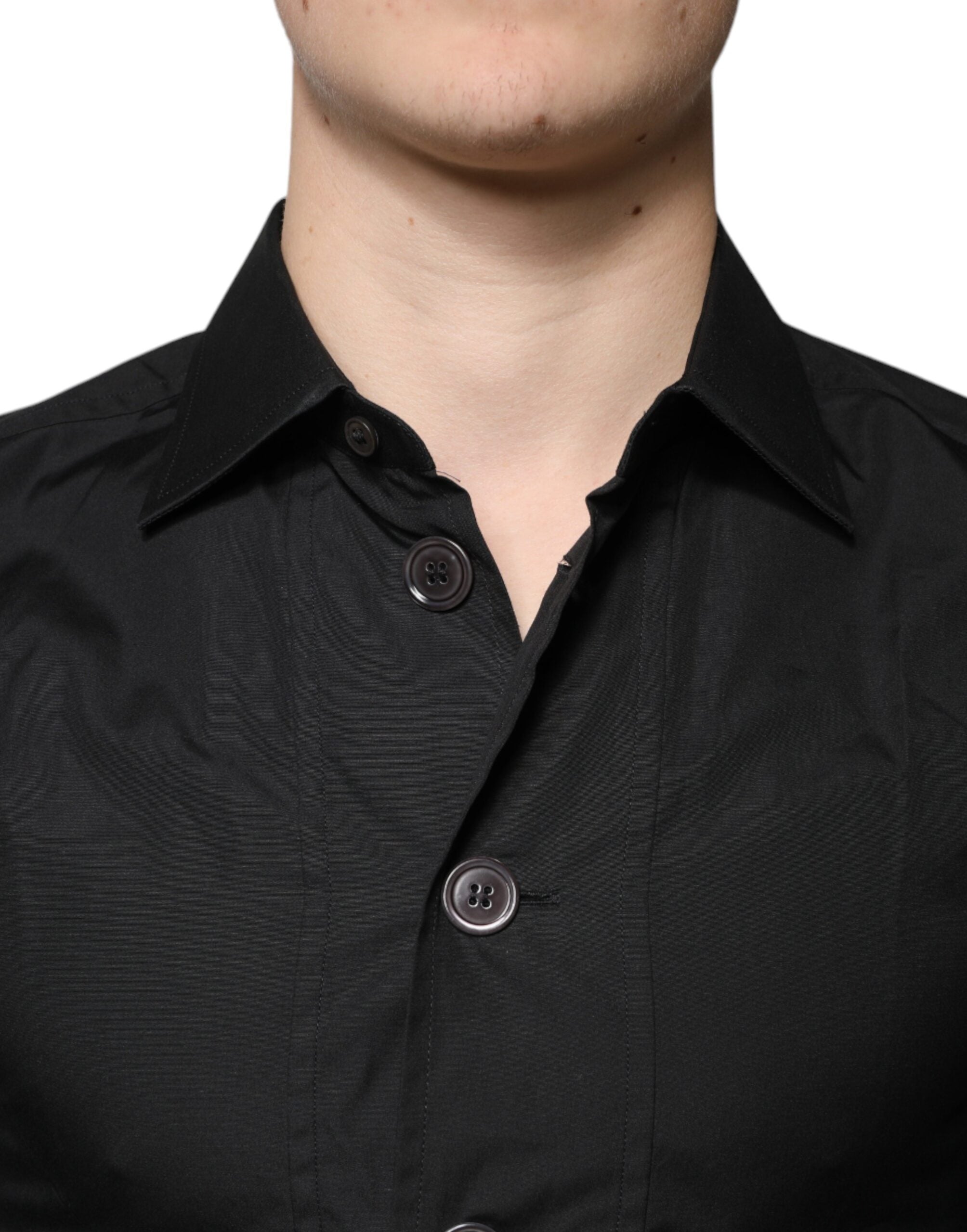 Chemise noire en coton Dolce & Gabbana à manches longues pour homme, élégante et formelle, avec col classique et boutons.