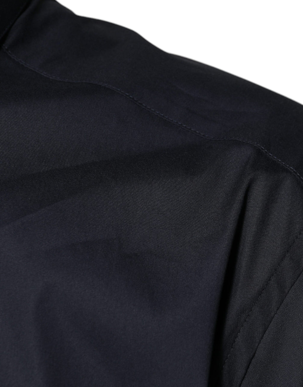 Chemise formelle noire en coton mélangé Dolce & Gabbana avec détails dorés, vue de face.