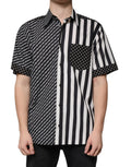 Chemise décontractée à rayures noires et blanches de Dolce & Gabbana, avec boutons, style casual.