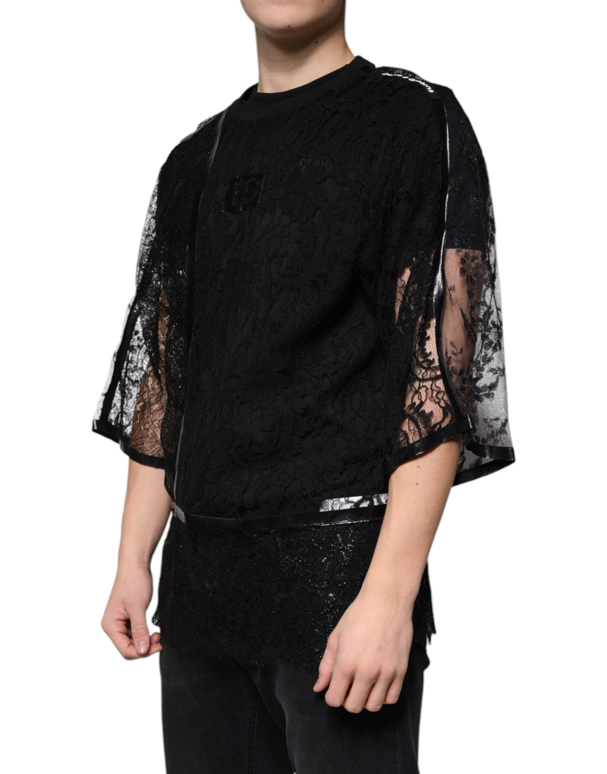 T-shirt noir en nylon avec broderie florale en dentelle et col rond de Dolce & Gabbana, vue de face.