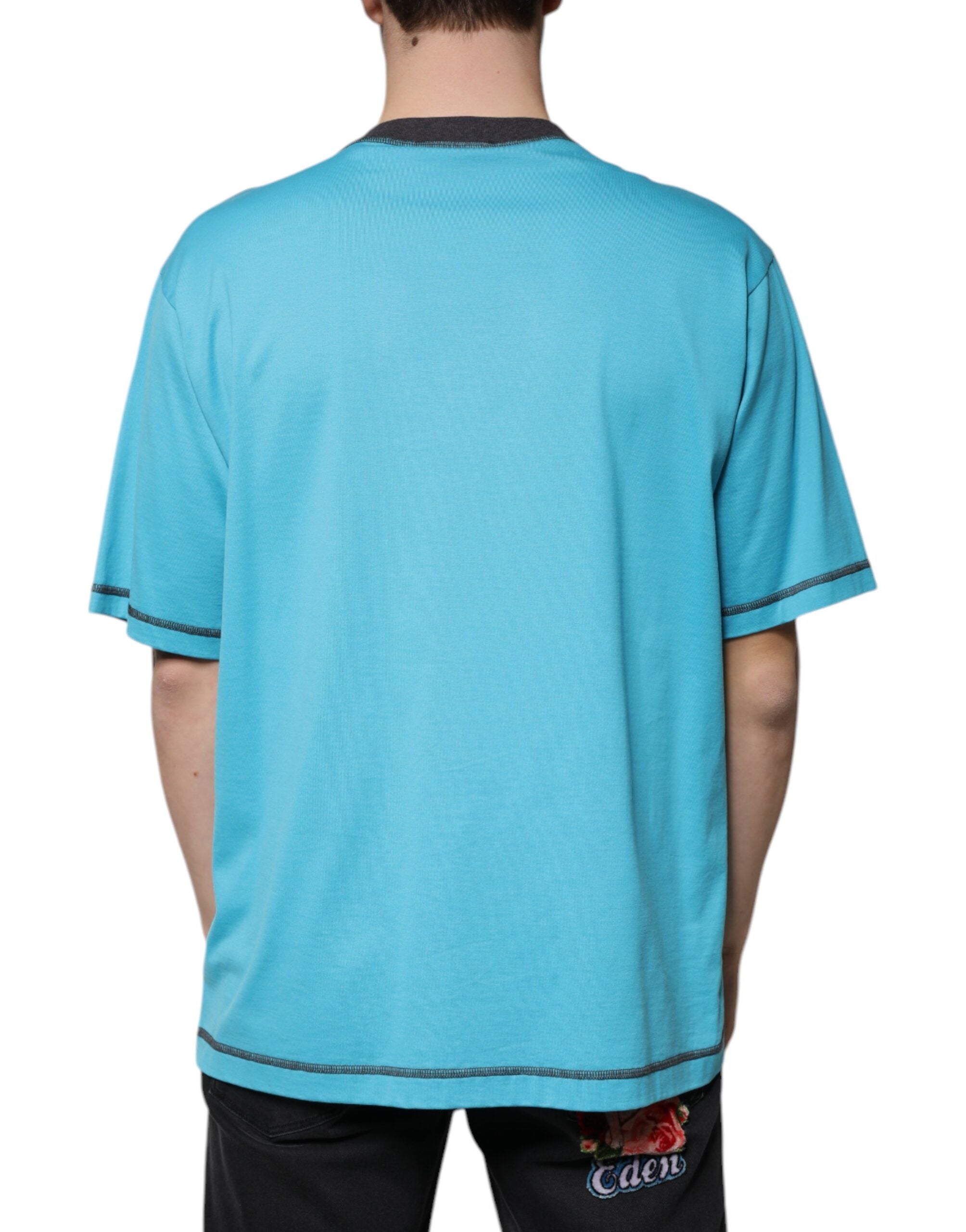 T-shirt à manches courtes Dolce & Gabbana bleu avec logo, col rond, design élégant et moderne.