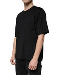 T-shirt noir en coton Dolce & Gabbana à col rond et manches courtes, vue de face.