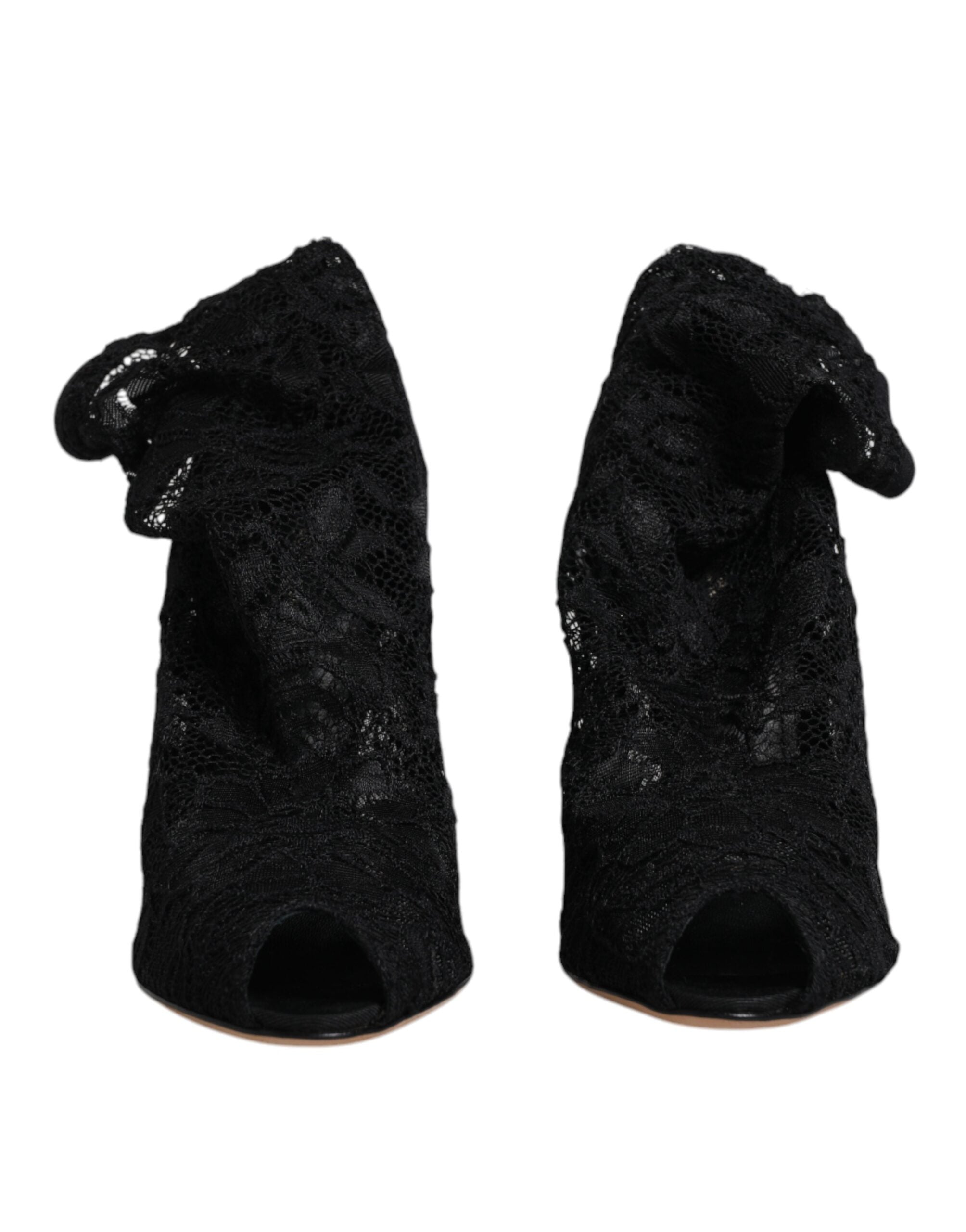 Chaussures Dolce & Gabbana à talons, bottines noires en dentelle extensible, mi-mollet, élégantes et sophistiquées.