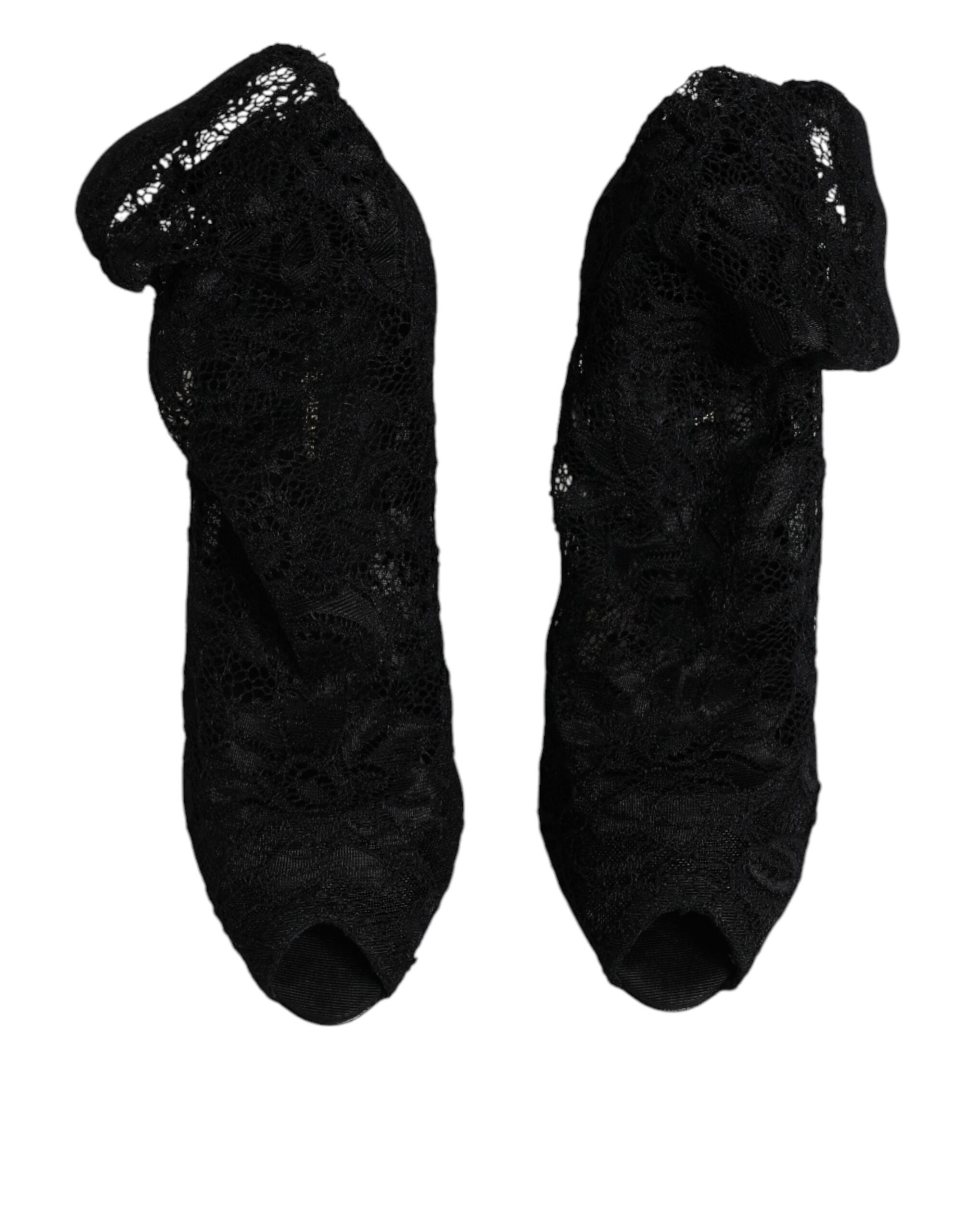Chaussures Dolce & Gabbana à talons noirs en dentelle extensible, bottines mi-mollet élégantes et sophistiquées.