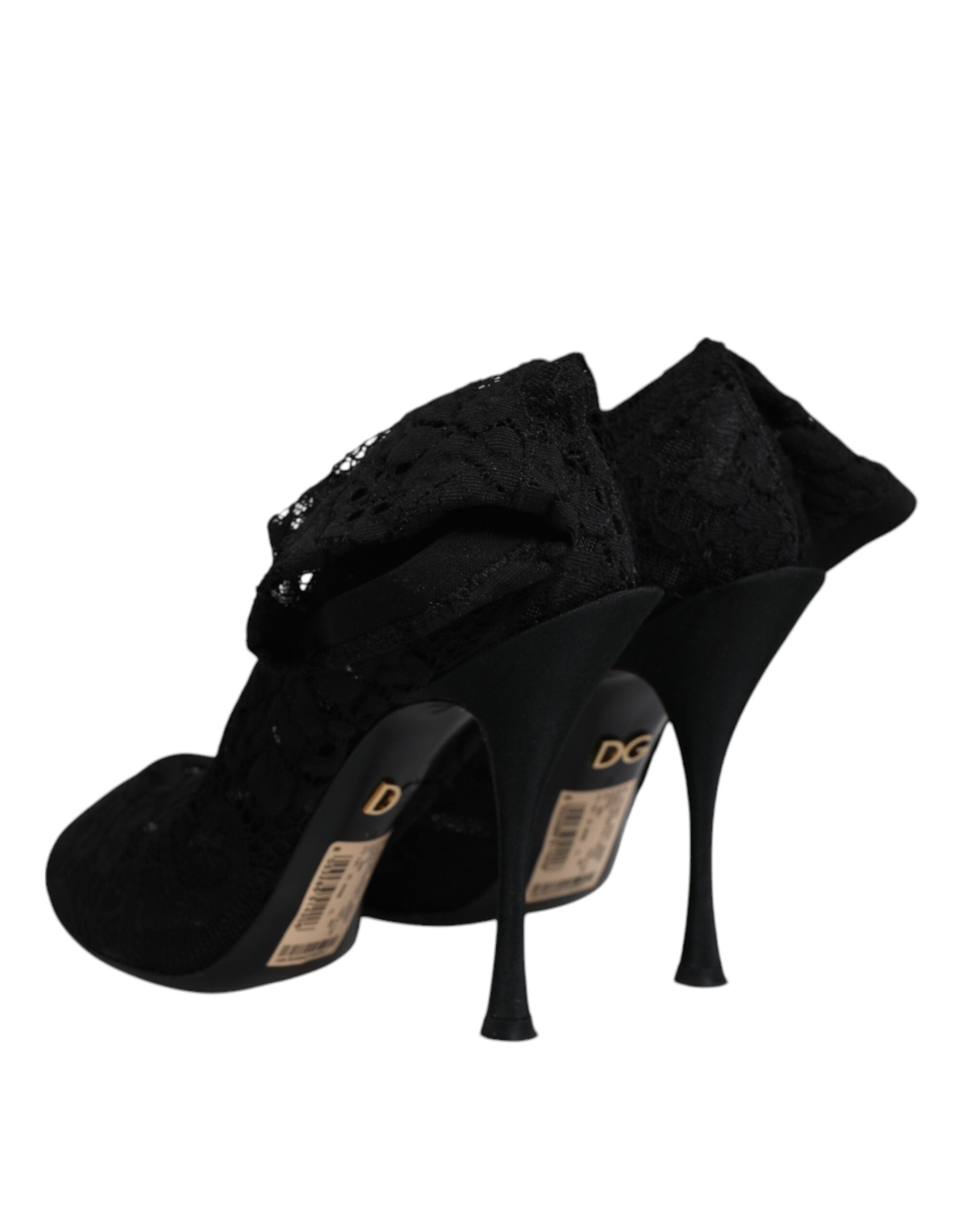 Chaussures Dolce & Gabbana bottines noires en dentelle stretch mi-mollet, talons élégants et design sophistiqué.