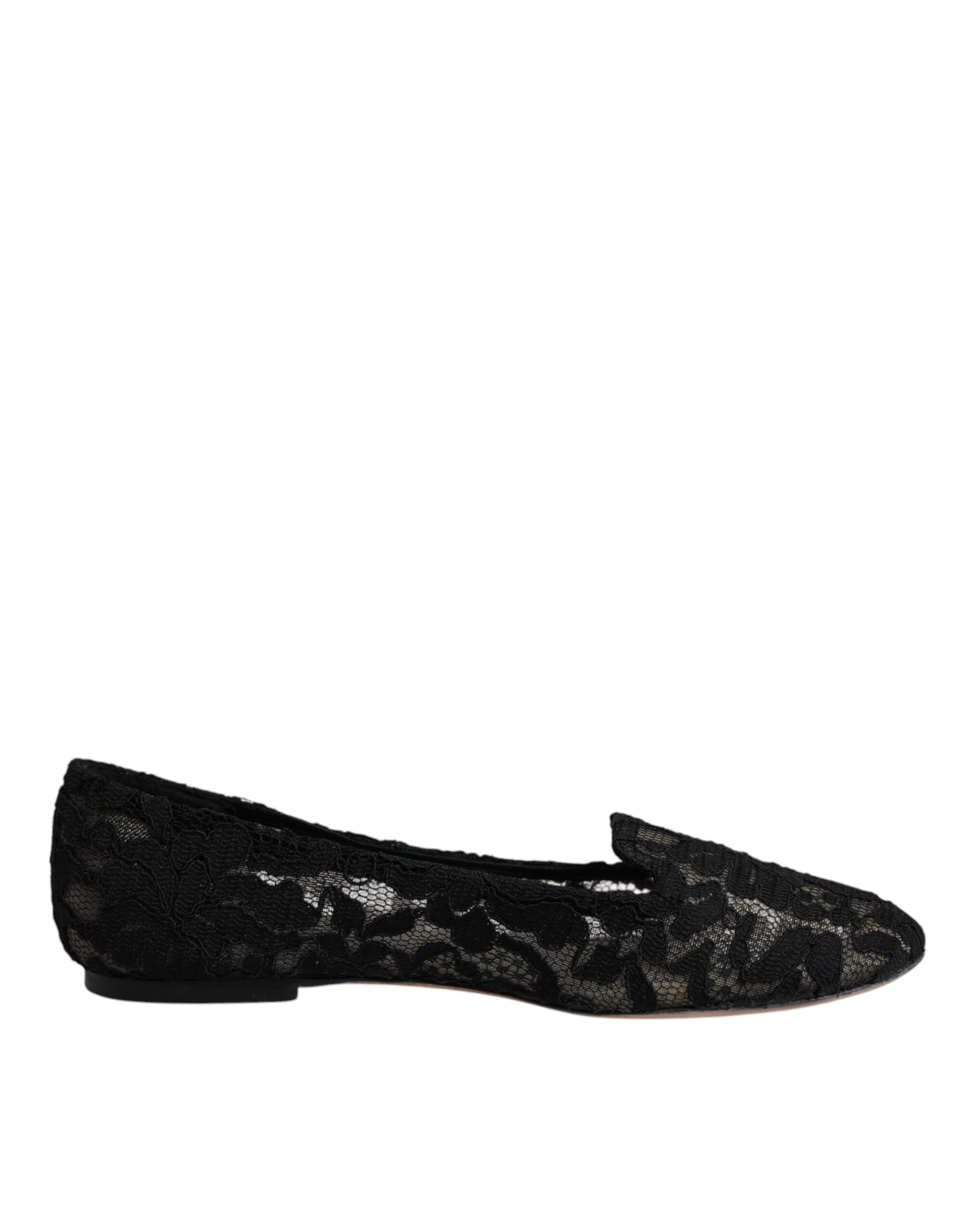 Chaussures plates Dolce & Gabbana Taormina en dentelle noire, style slip-on élégante et confortable.