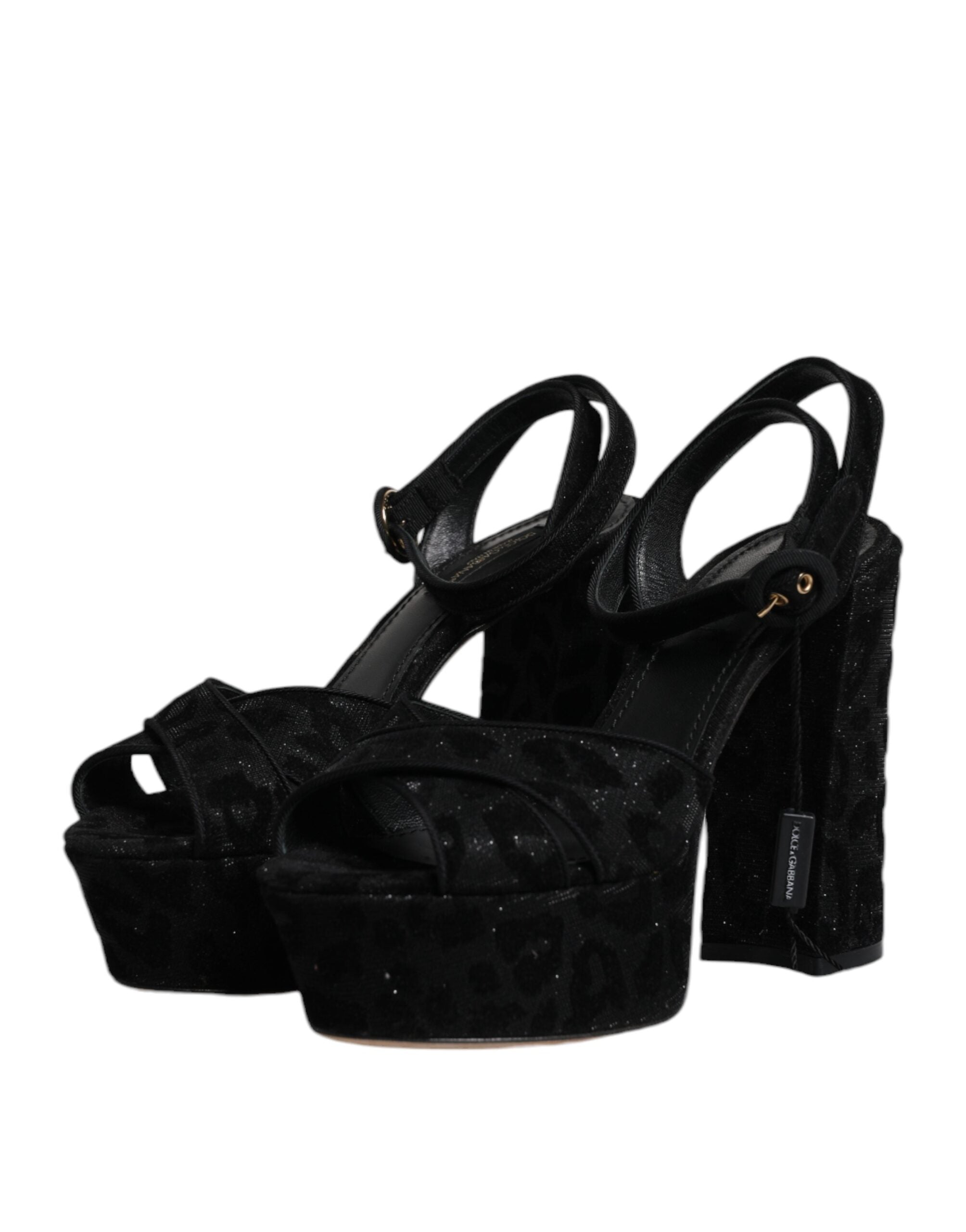Sandales à talons plateforme Dolce & Gabbana noires avec motif léopard, design élégant et sophistiqué.