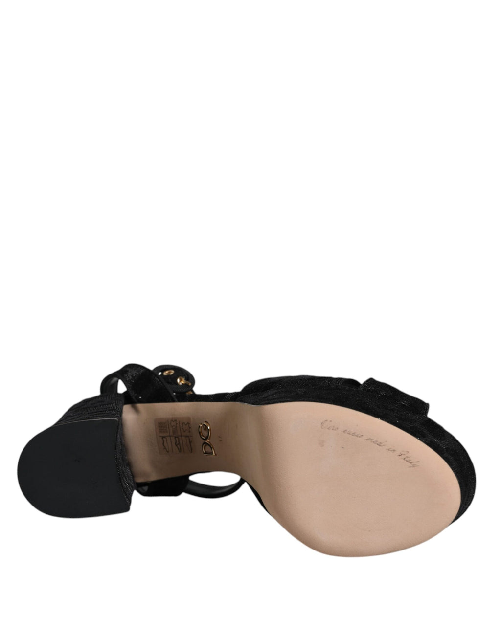 Chaussures à talons plateforme Dolce & Gabbana noires à motif léopard, sandales élégantes avec talons hauts, visibles en détail.