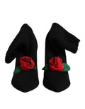 Chaussures Dolce & Gabbana, bottines noires à talons stilettos et mi-mollet, élégantes et sophistiquées.