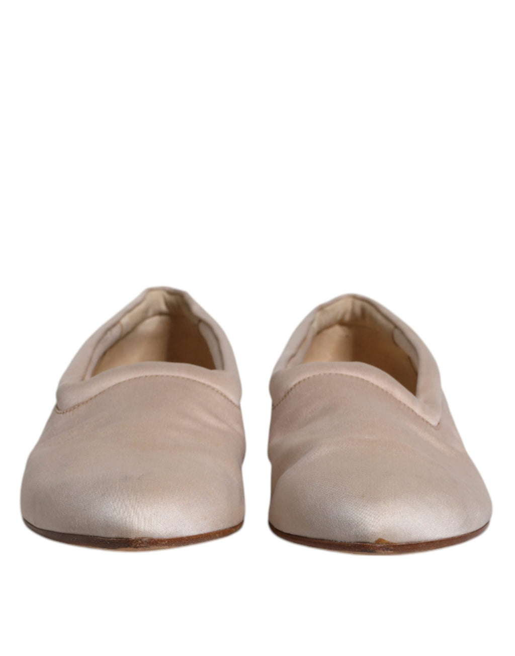 Chaussures ballerines Dolce & Gabbana en tissu beige, slip-on élégantes et confortables, vues de face sur fond neutre.