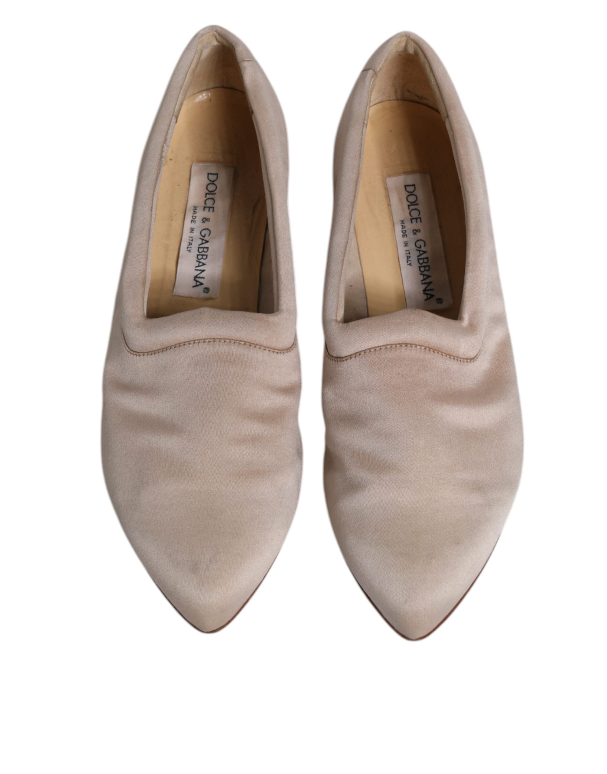 Chaussures ballerines Dolce & Gabbana en tissu beige, slip-on et élégantes, parfaites pour un look sophistiqué.
