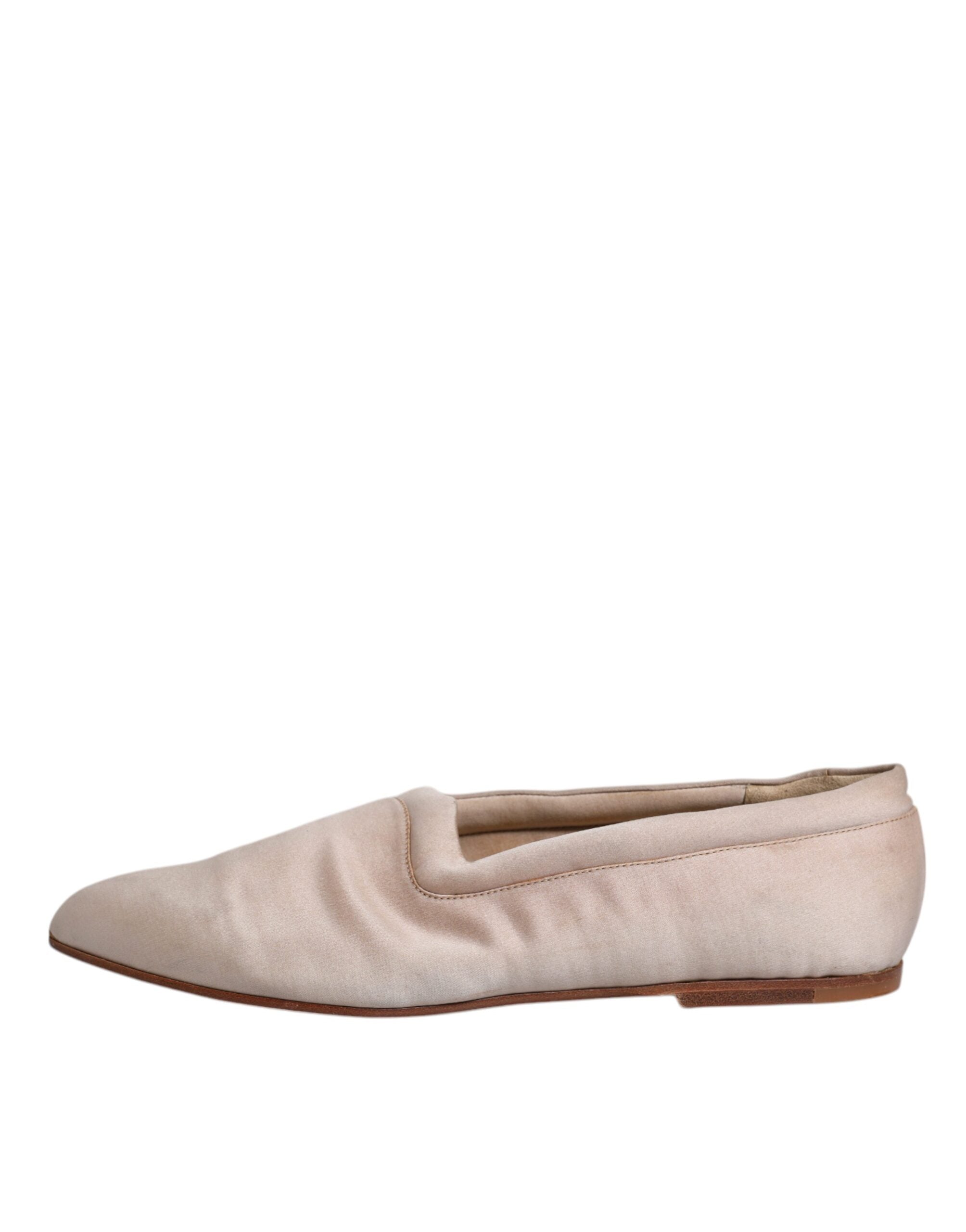 Chaussures ballerines Dolce & Gabbana en tissu beige, faciles à enfiler et élégantes, vues de côté.