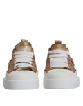 Chaussures basses Dolce & Gabbana or blanc avec logo, sneakers en cuir pour homme, vue de face.