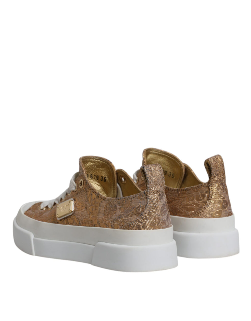 Chaussures sneakers basses Dolce & Gabbana en or et blanc avec logo visible, denim et semelle en caoutchouc.