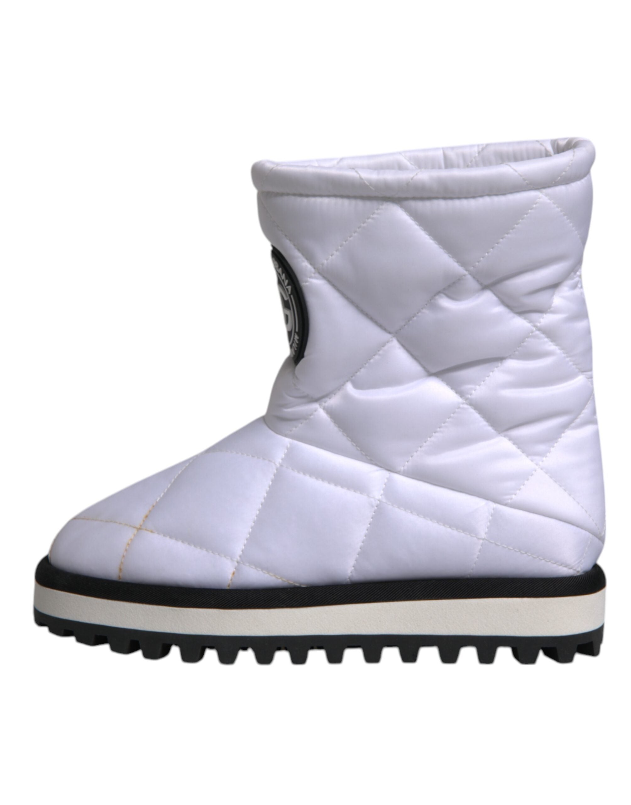 Bottes mi-mollet en viscose blanche de Dolce & Gabbana, chaussures rembourrées élégantes et modernes.