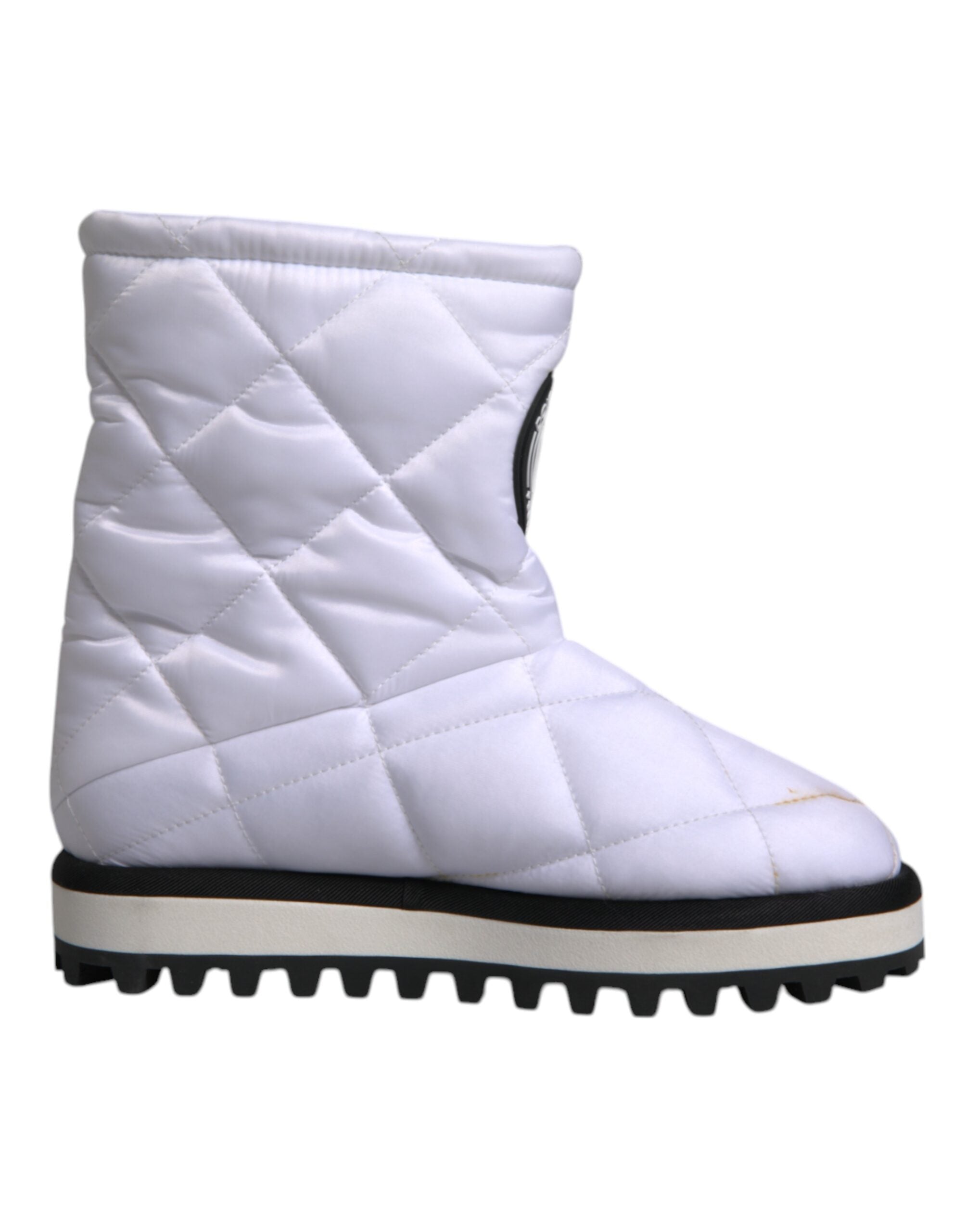 Bottes mi-mollet en viscose blanche de Dolce & Gabbana, chaussures rembourrées élégantes et modernes.