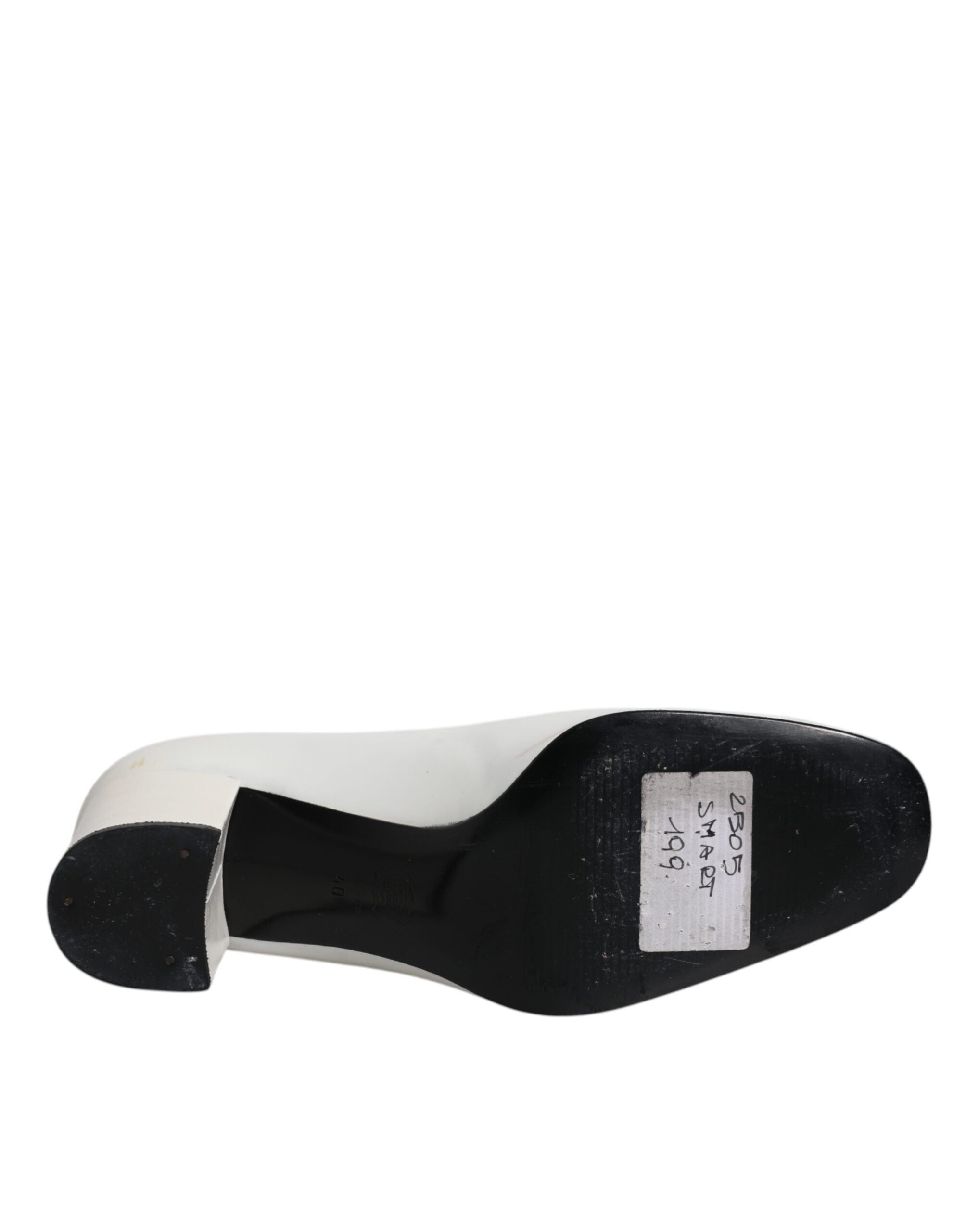 Escarpins Dolce & Gabbana en cuir blanc avec talons blocs et bout pointu, chaussures élégantes pour femmes.