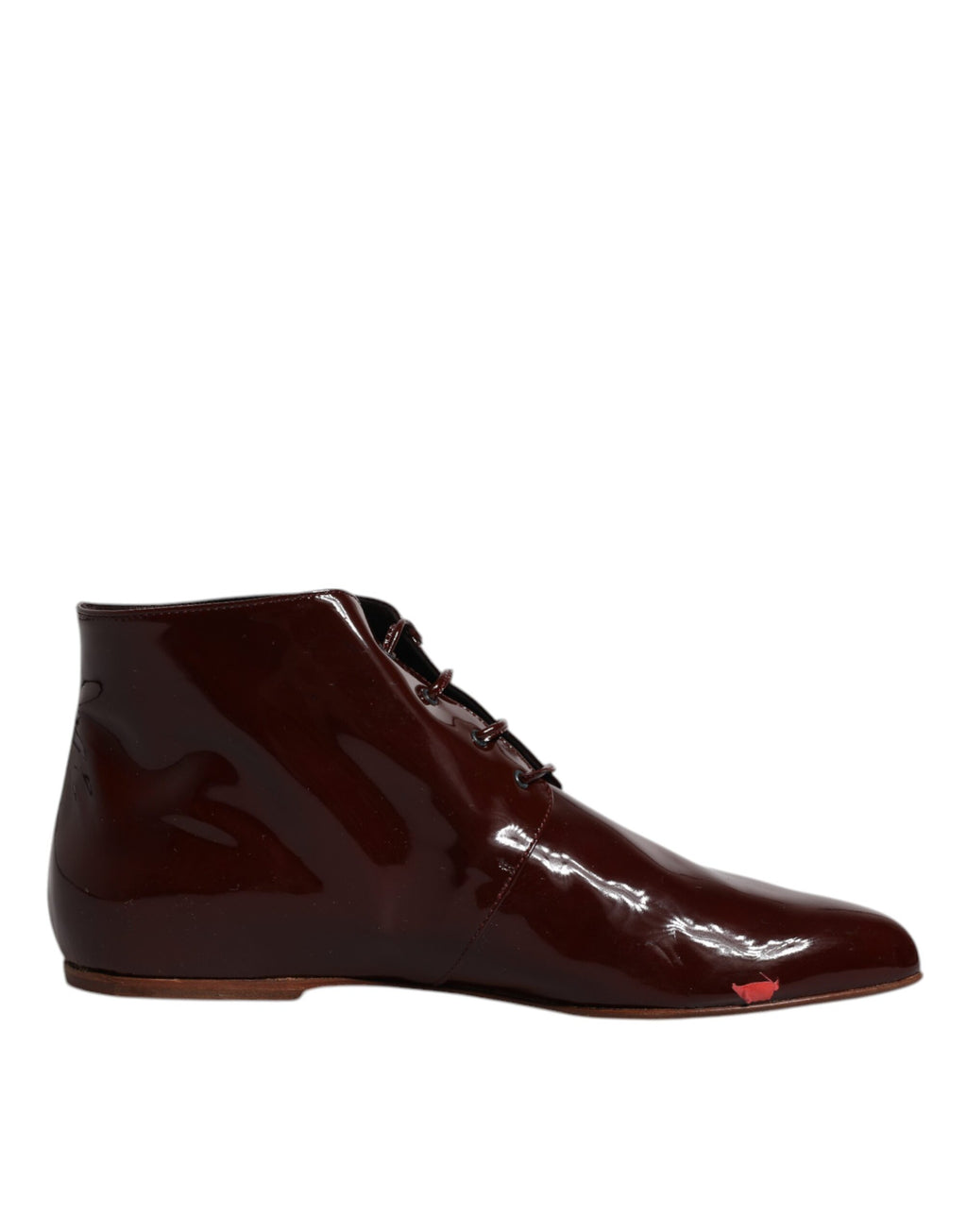 Bottines en cuir marron foncé Dolce & Gabbana avec lacets et semelle en caoutchouc, vue de face.