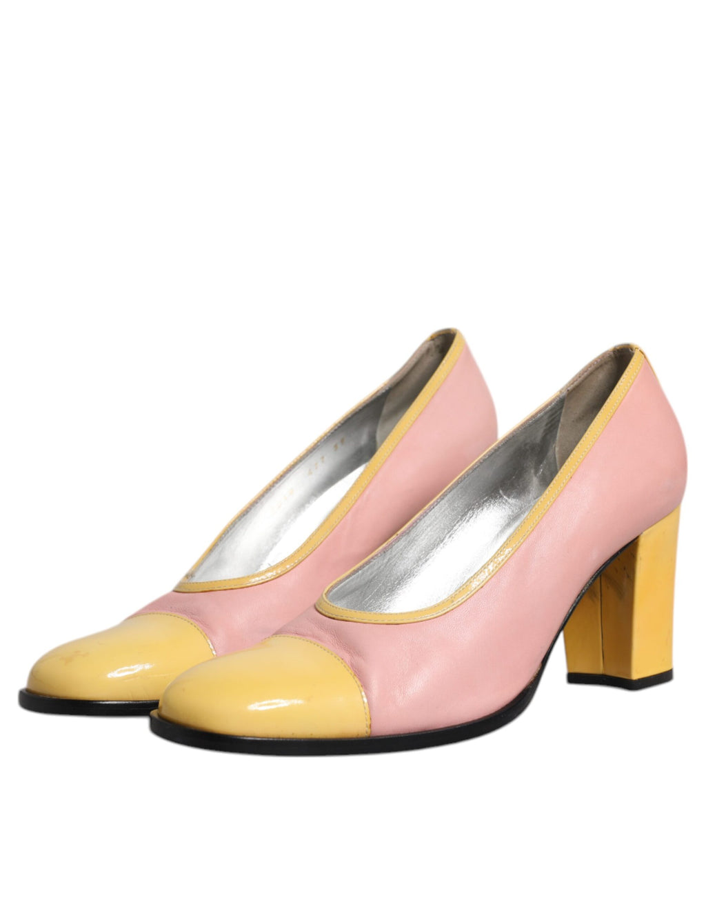 Chaussures à talons blocs en cuir rose et jaune de Dolce & Gabbana, élégantes et modernes.