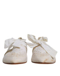 Chaussures ballerines Dolce & Gabbana en tissu blanc avec ruban, élégantes et confortables, vues de face.
