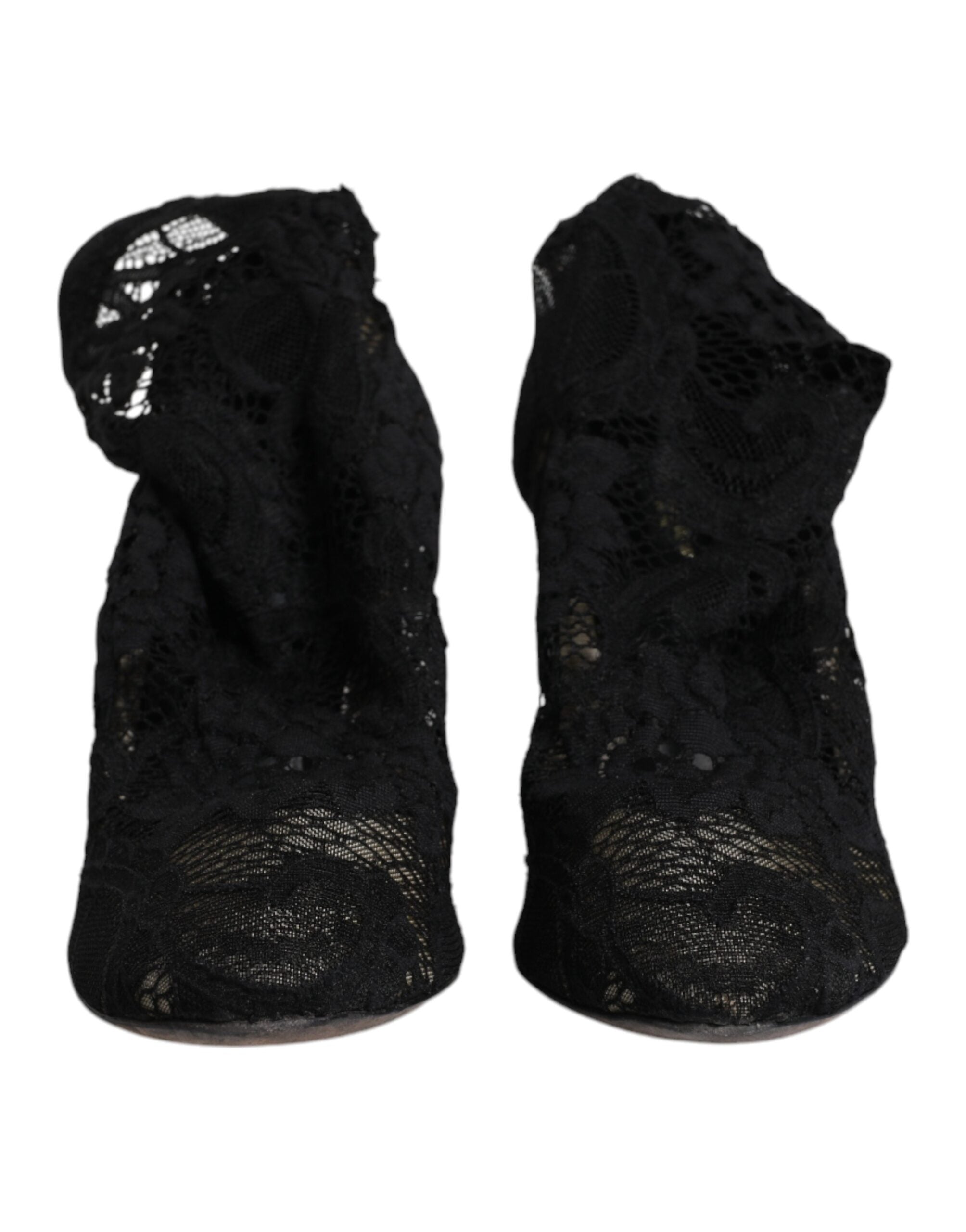 Chaussures Dolce & Gabbana à talons noirs en dentelle extensible, bottines mi-mollet élégantes avec semelle en cuir.