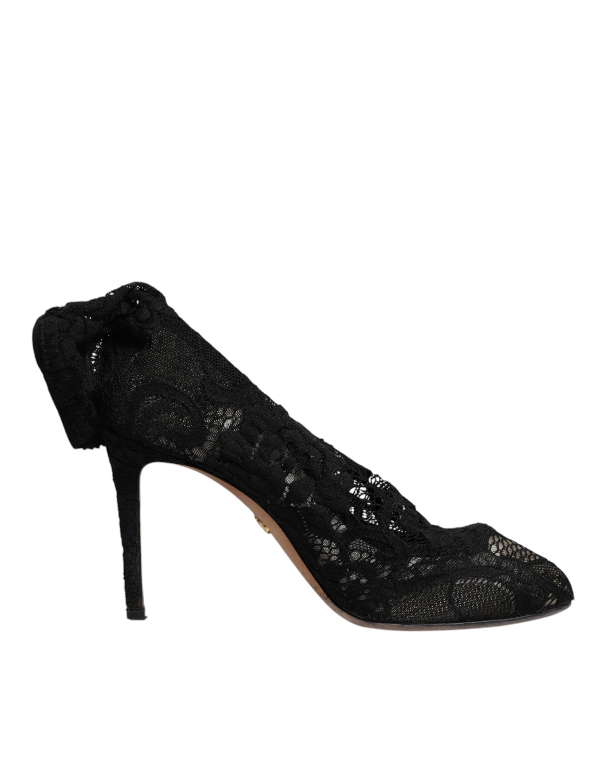 Chaussures Dolce & Gabbana à talons noirs en dentelle extensible et bottes mi-mollet élégantes.