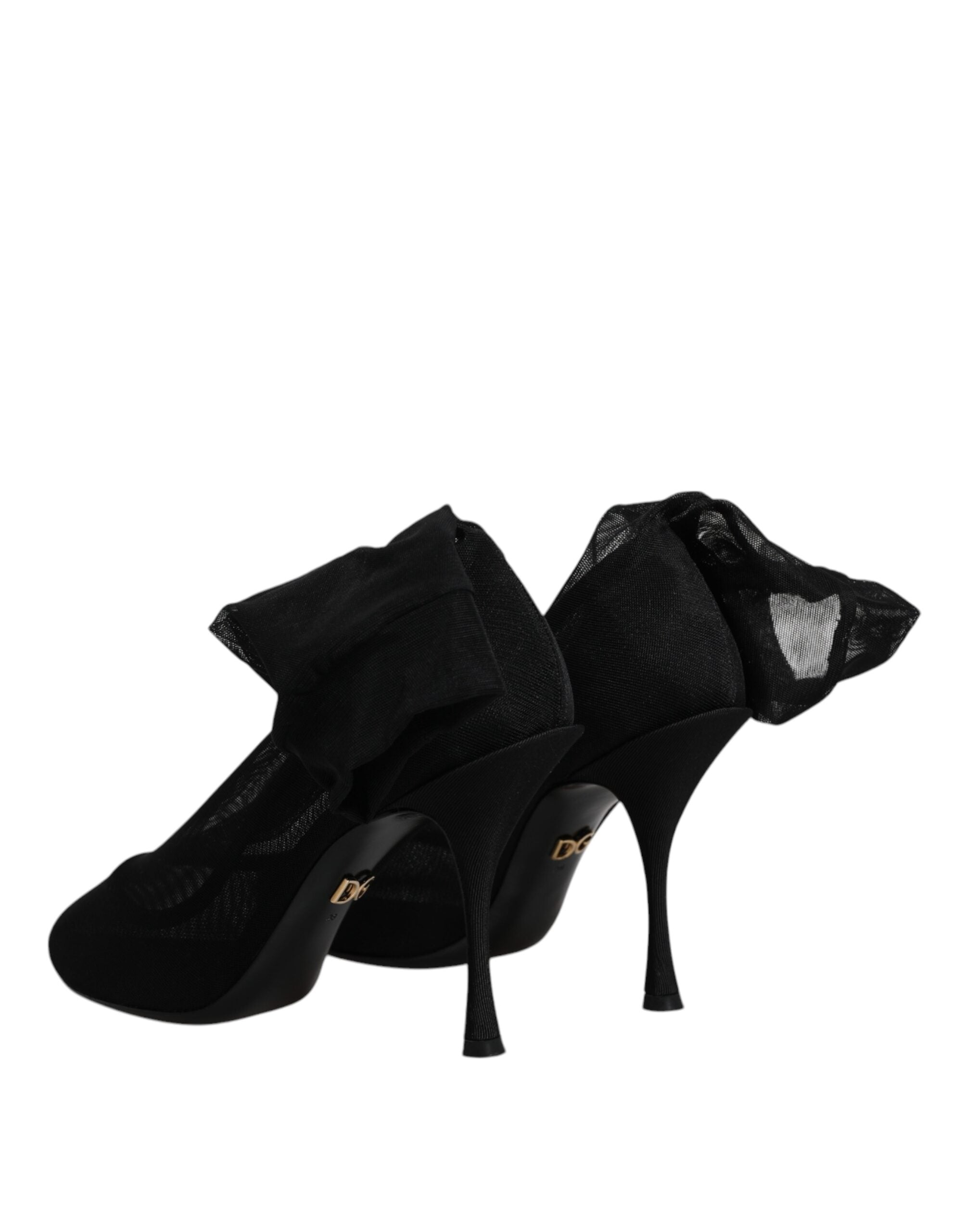 Bottes en résille de soie noire Dolce & Gabbana, style chaussette, avec talons et design élégant visible en image.