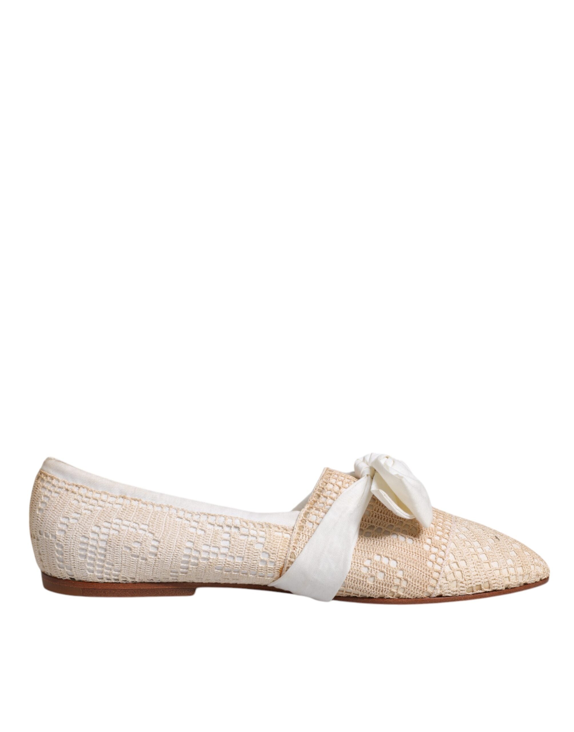 Chaussures ballerines Dolce & Gabbana en tissu beige avec ruban, vue de face, élégantes et confortables.