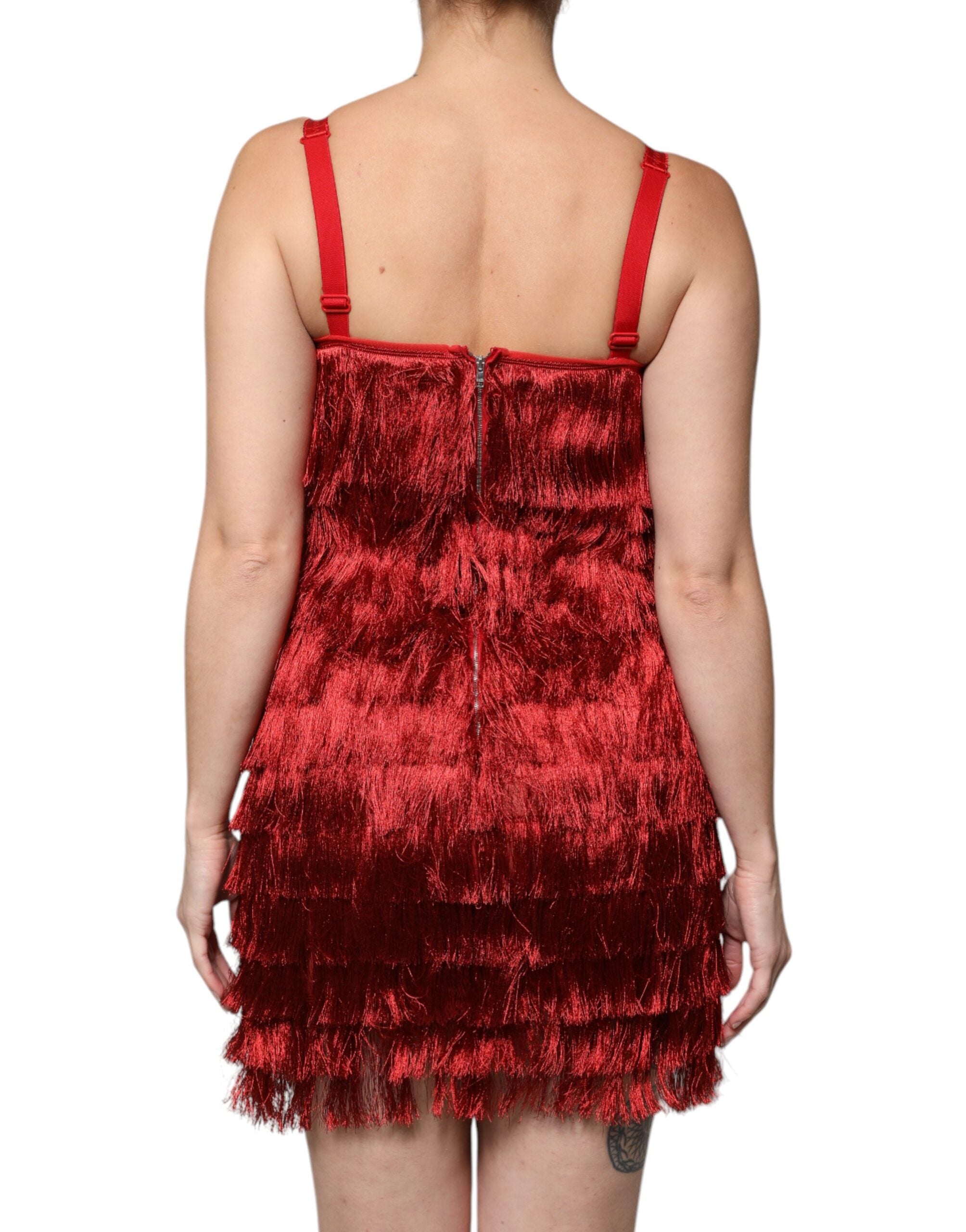 Robe bustier sans manches en dentelle rouge Dolce & Gabbana avec franges et coupe moulante, élégante et raffinée.