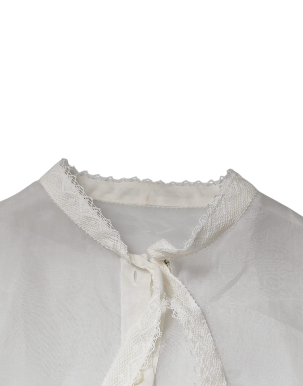 Chemisier blanc Dolce & Gabbana à col ascot, manches longues, élégant et sophistiqué, visible en gros plan.