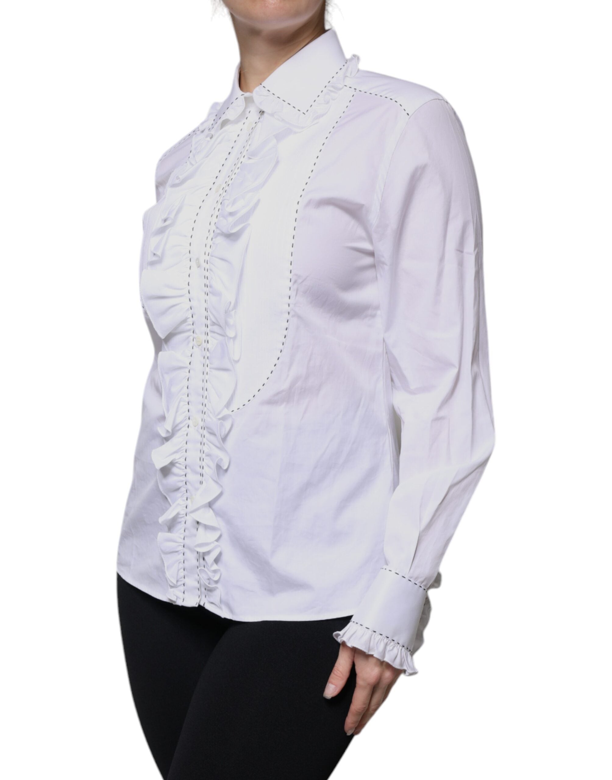 Chemisier blanc en coton à manches longues avec col à volants de Dolce & Gabbana, élégant et sophistiqué.